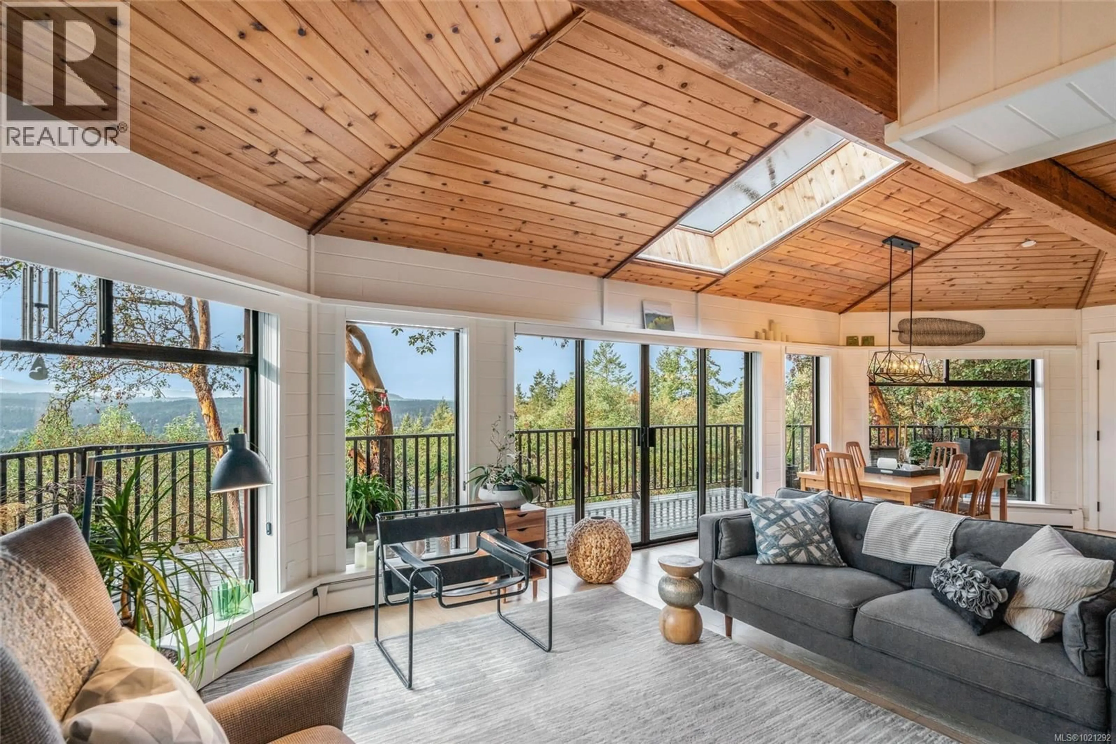 Living room with furniture, wood/laminate floor for 2358 CHAIN WAY, Nanoose Bay British Columbia V9P9G2