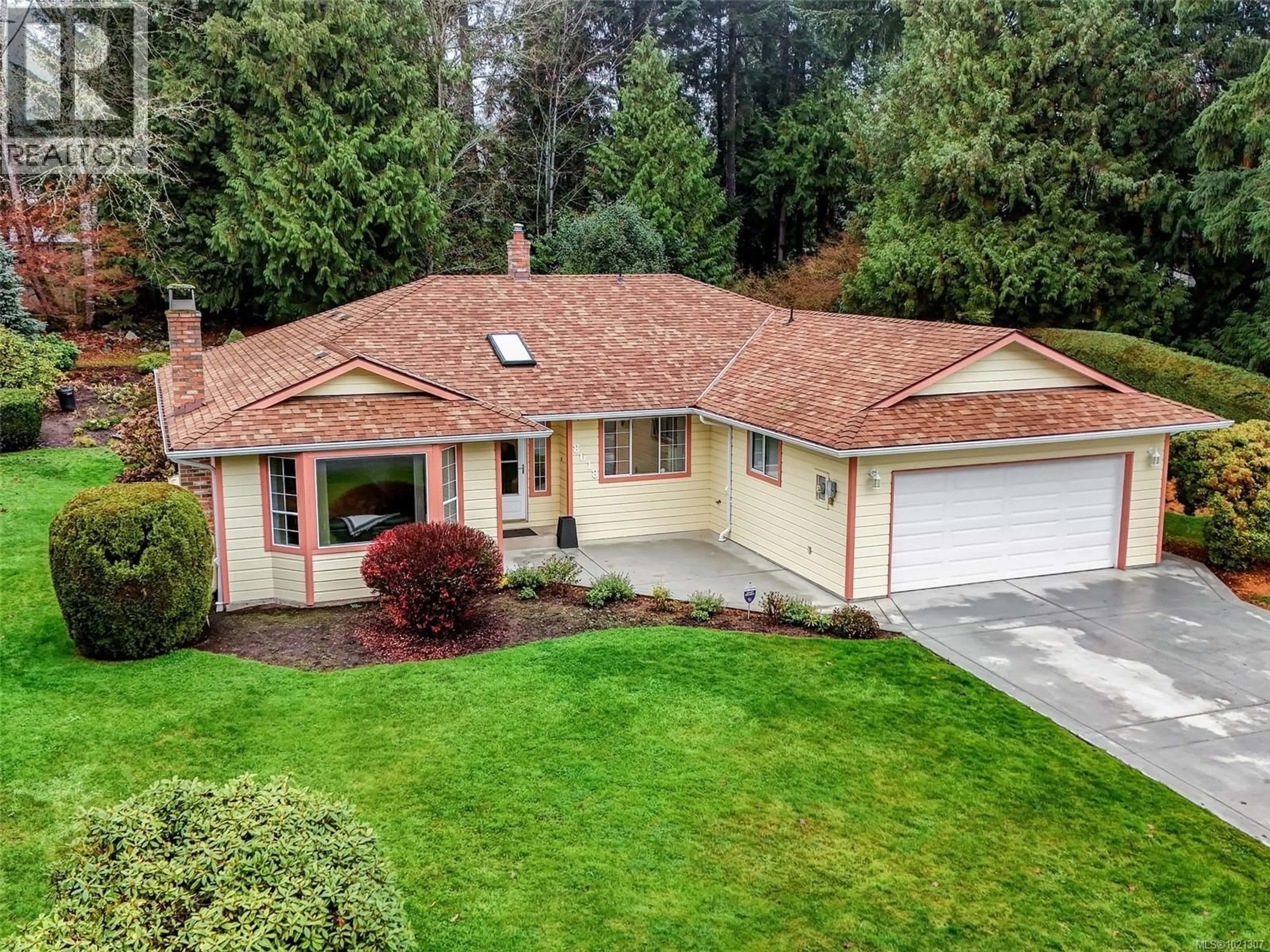 A pic from outside/outdoor area/front of a property/back of a property/a pic from drone, street for 8618 KINGCOME CRESCENT, North Saanich British Columbia V8L5C8