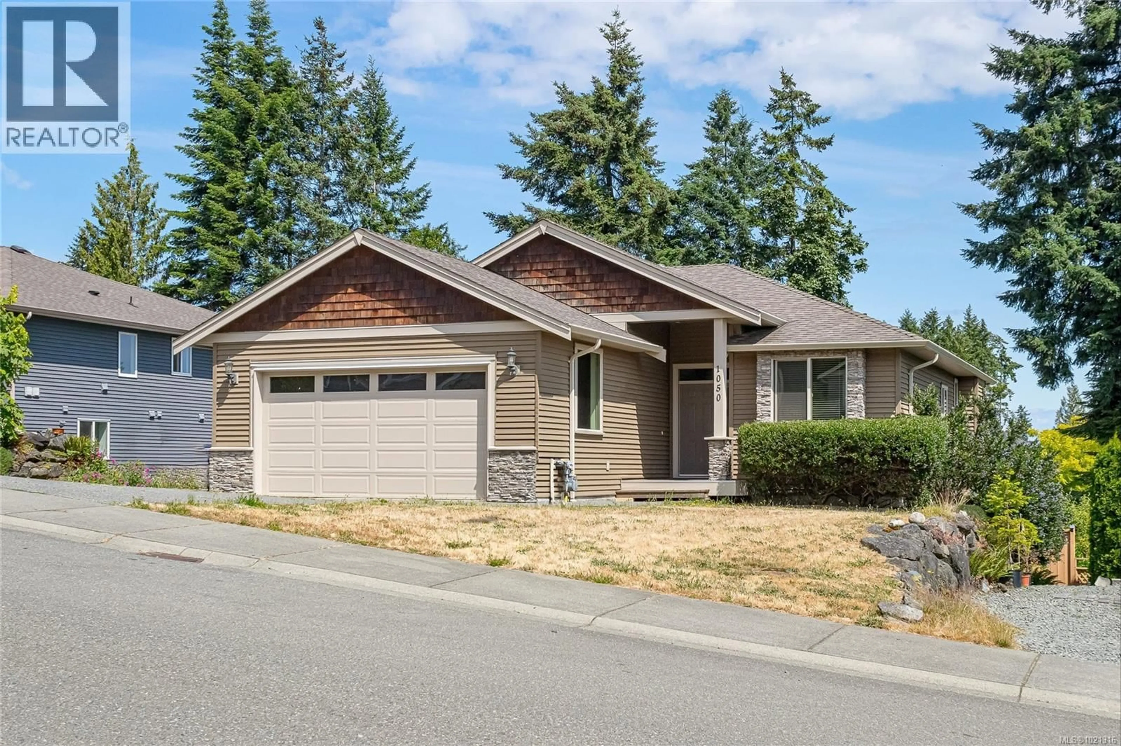 Home with vinyl exterior material, street for 1050 SOUTHWOOD DRIVE, Nanaimo British Columbia V9R0B2