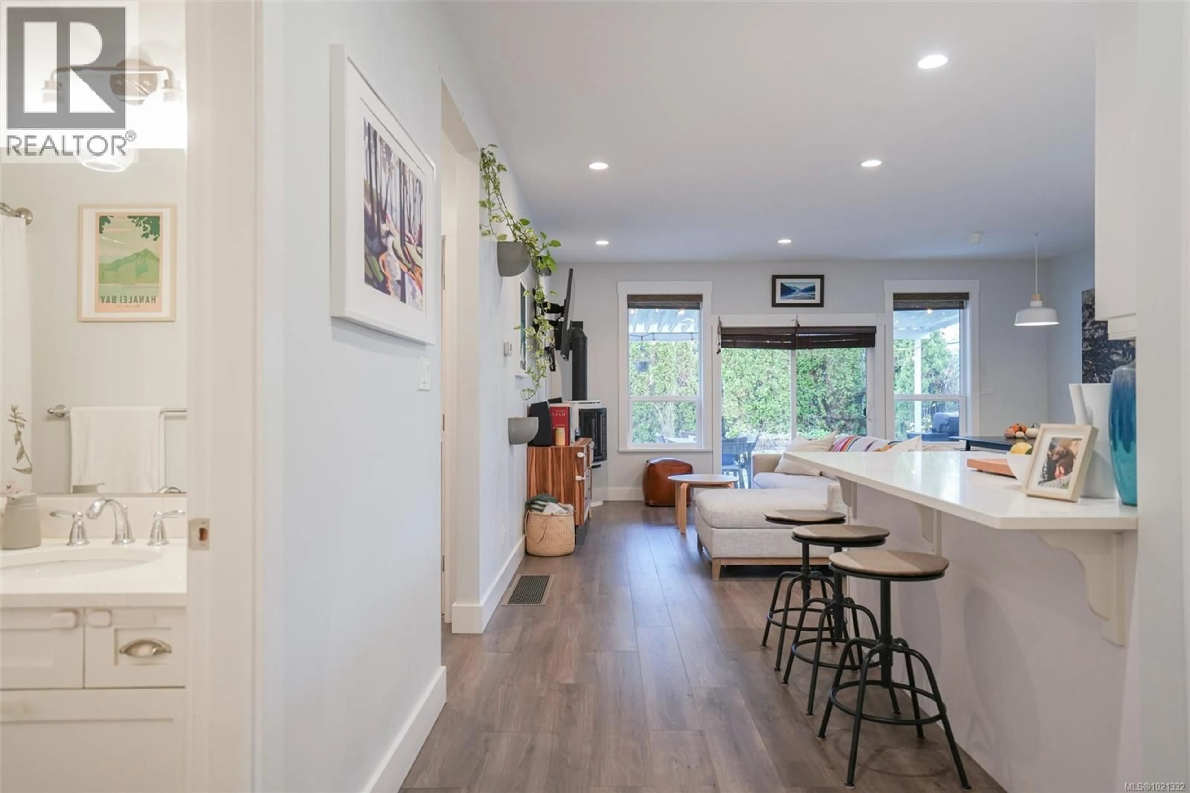 Open concept kitchen, wood/laminate floor for 4569 BEAUFORT STREET, Port Alberni British Columbia V9Y5R3