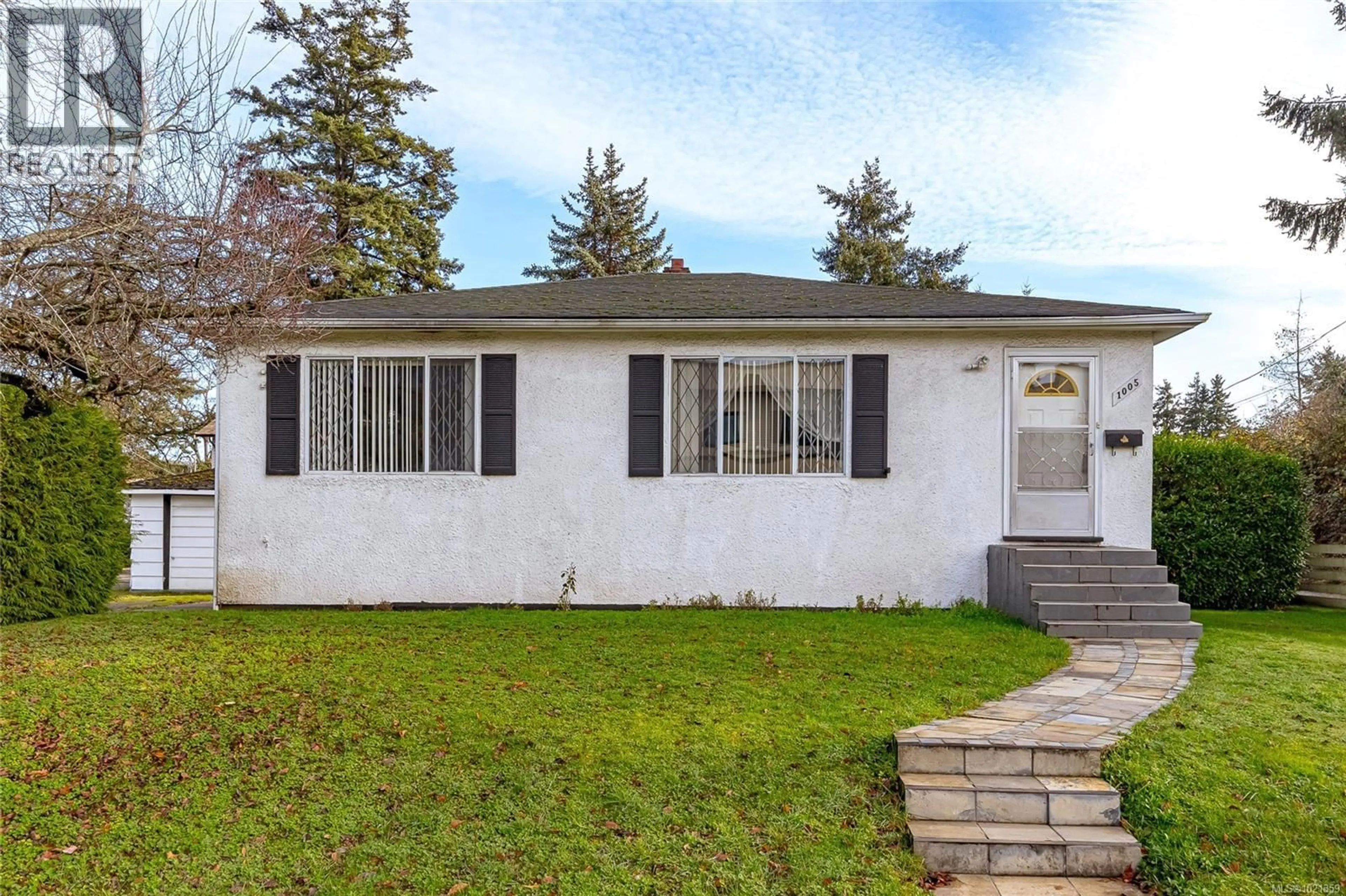 Home with vinyl exterior material, street for 1005 MCCALLUM ROAD, Langford British Columbia V9B4C7