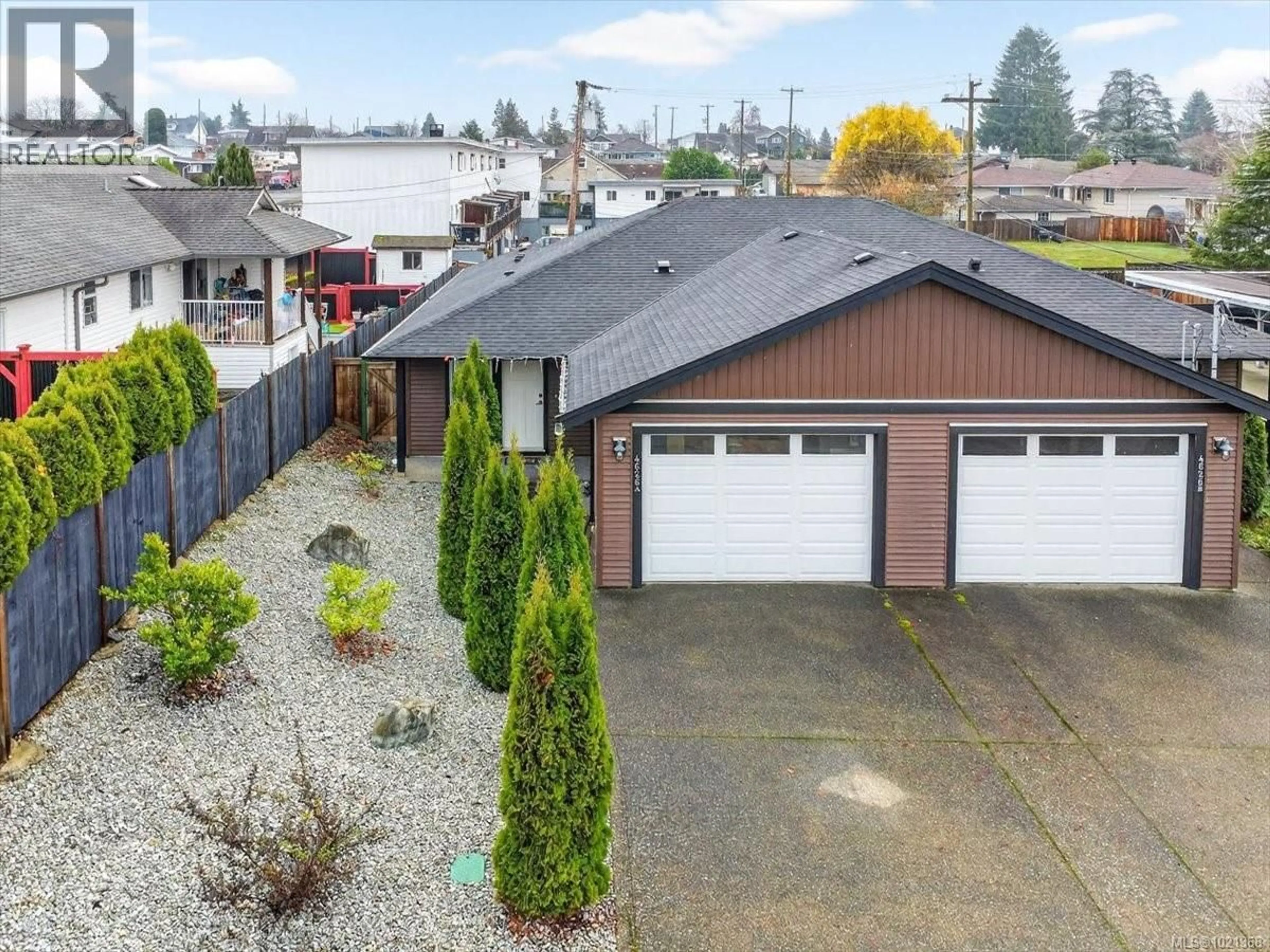 A pic from outside/outdoor area/front of a property/back of a property/a pic from drone, street for A - 4626 MAITLAND STREET, Port Alberni British Columbia V9Y7R4