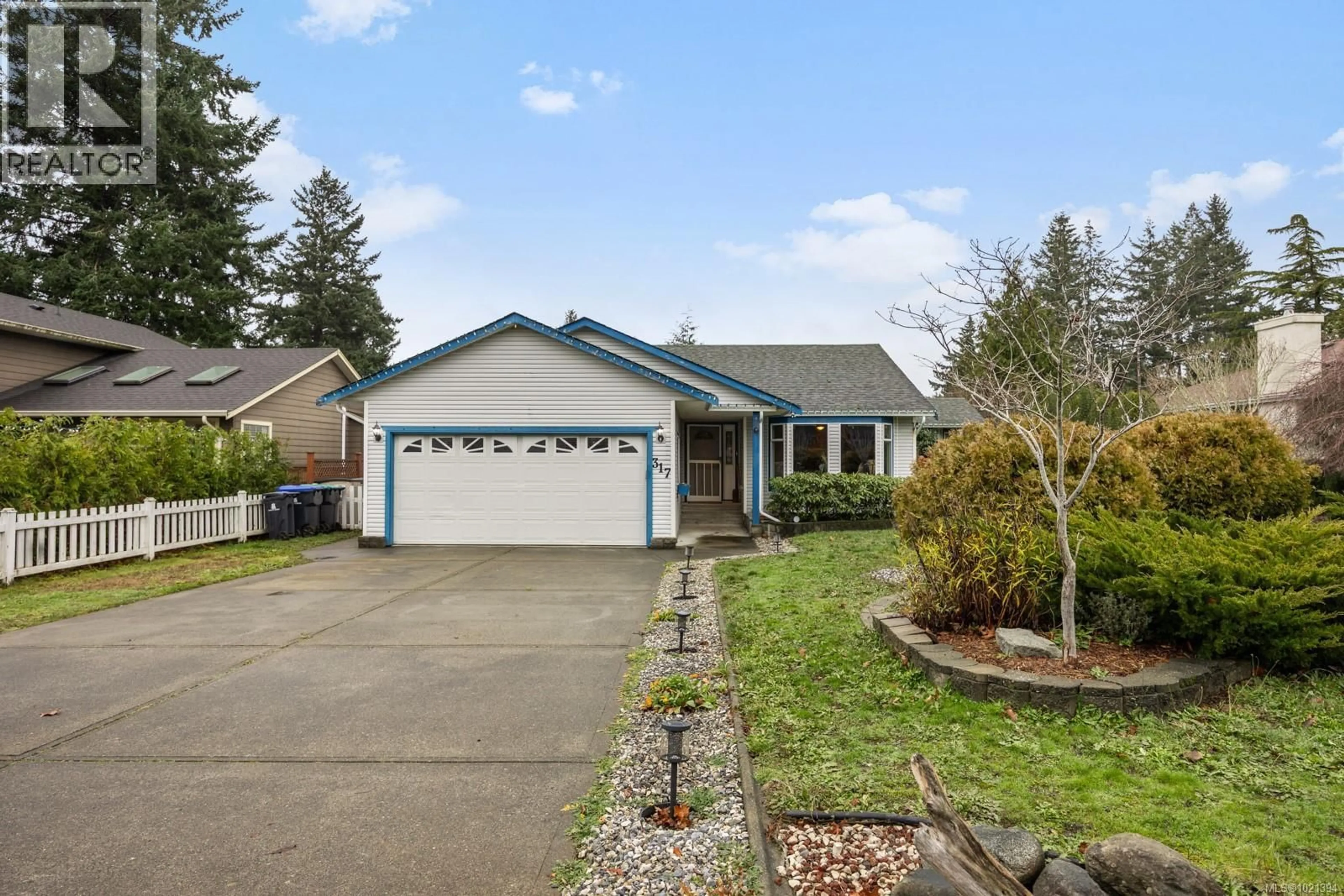 Home with vinyl exterior material, street for 317 QUARRY ROAD, Comox British Columbia V9M3C4