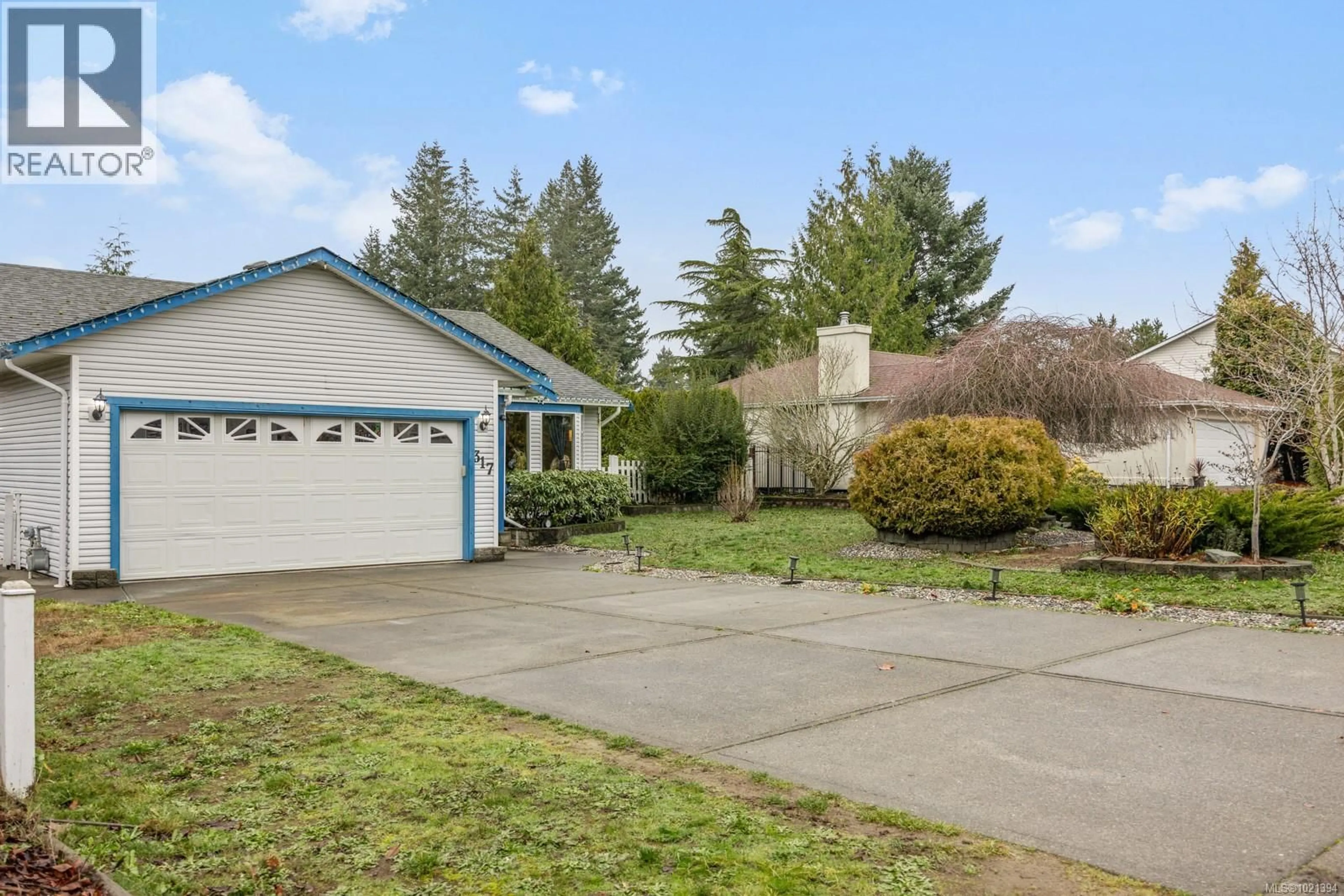 Home with vinyl exterior material, street for 317 QUARRY ROAD, Comox British Columbia V9M3C4