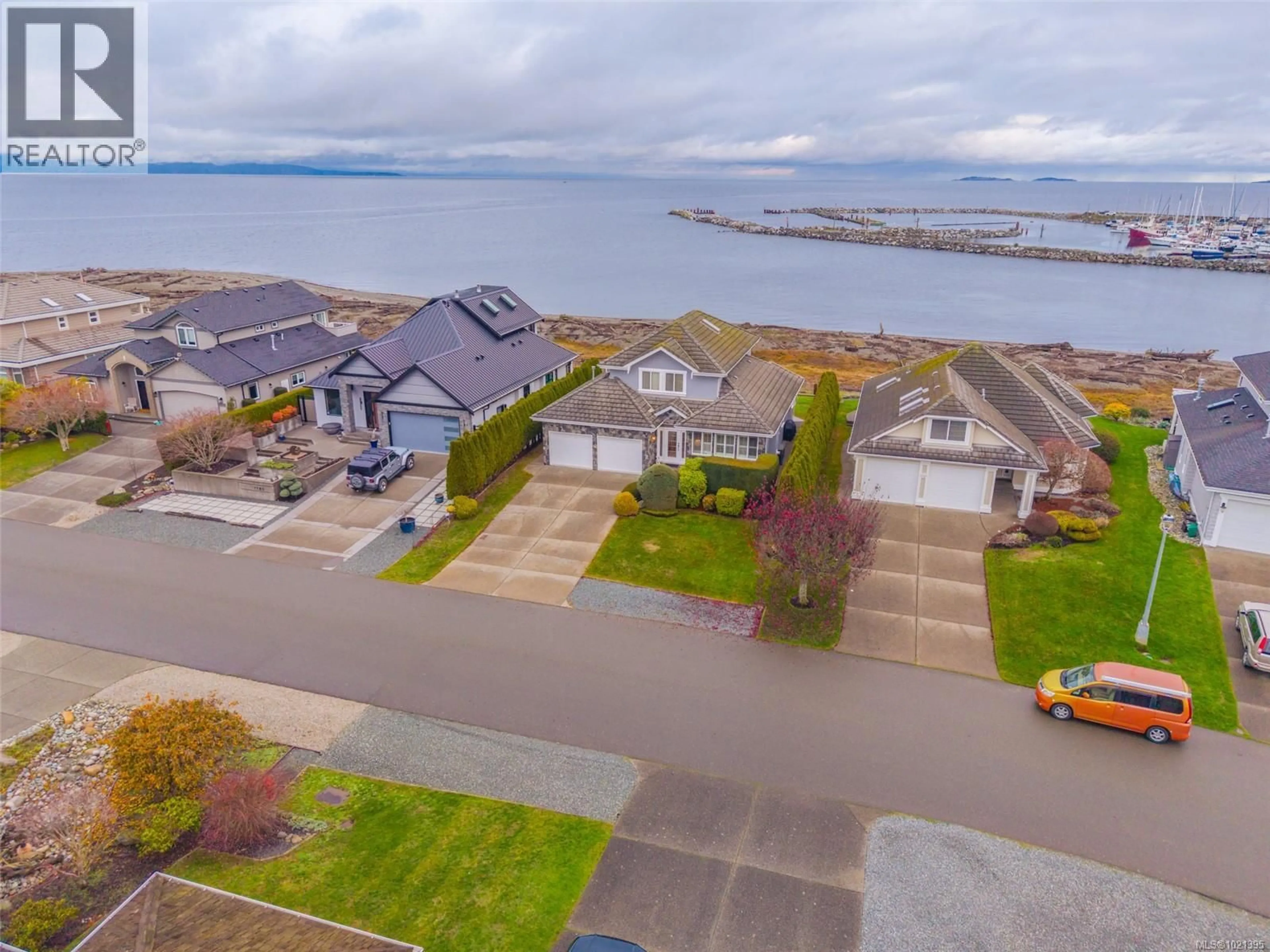 A pic from outside/outdoor area/front of a property/back of a property/a pic from drone, water/lake/river/ocean view for 1765 ADMIRAL TRYON BOULEVARD, French Creek British Columbia V9P2V2