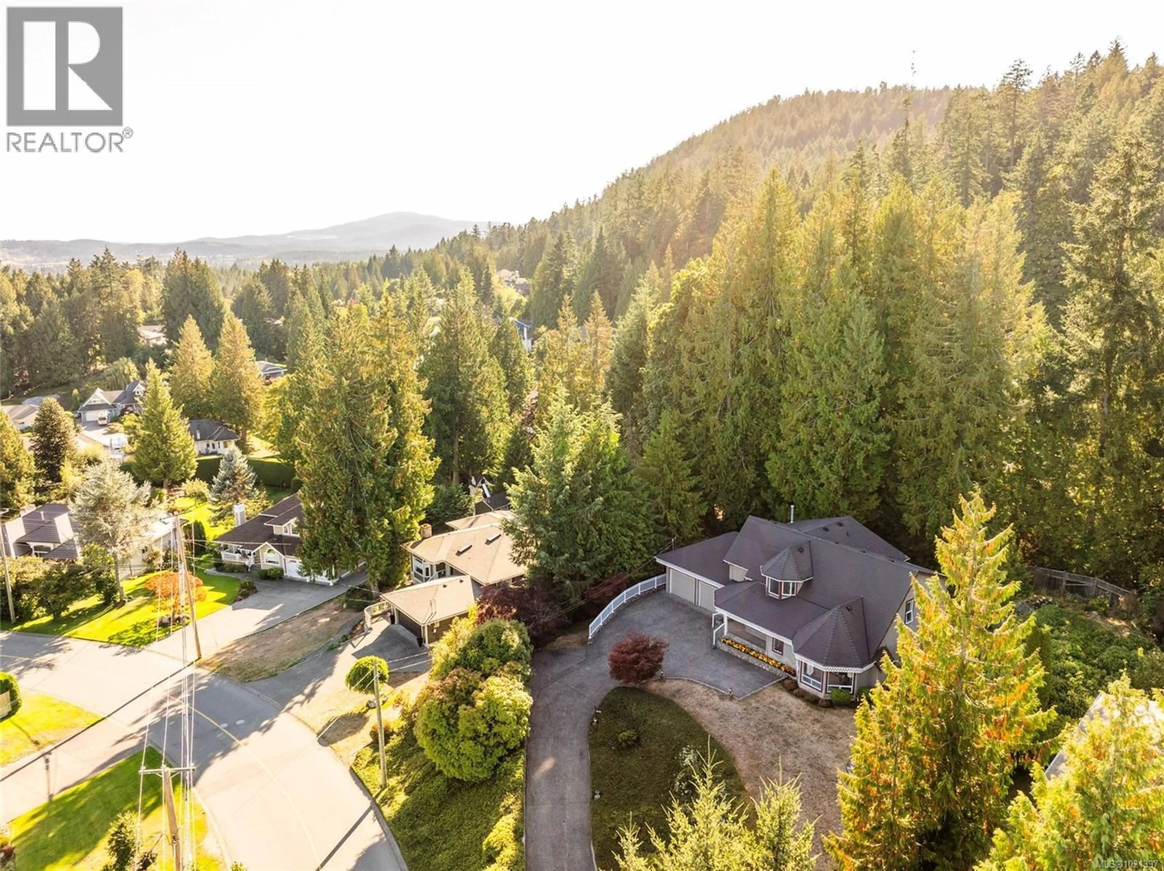 A pic from outside/outdoor area/front of a property/back of a property/a pic from drone, forest/trees view for 1575 DEAN PARK ROAD, North Saanich British Columbia V8L5E5