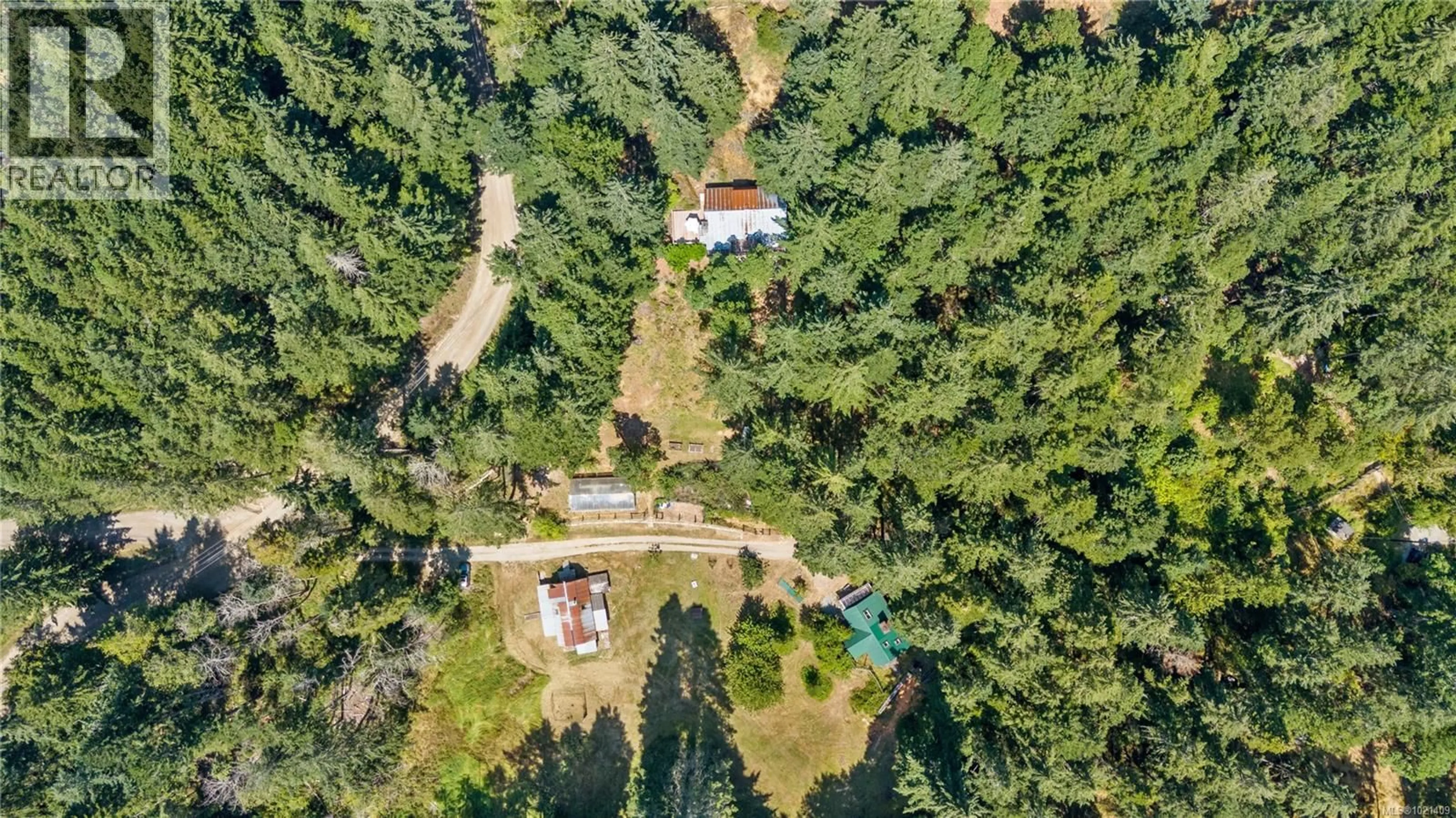A pic from outside/outdoor area/front of a property/back of a property/a pic from drone, forest/trees view for 185 BULMAN ROAD, Salt Spring British Columbia V8K1X5