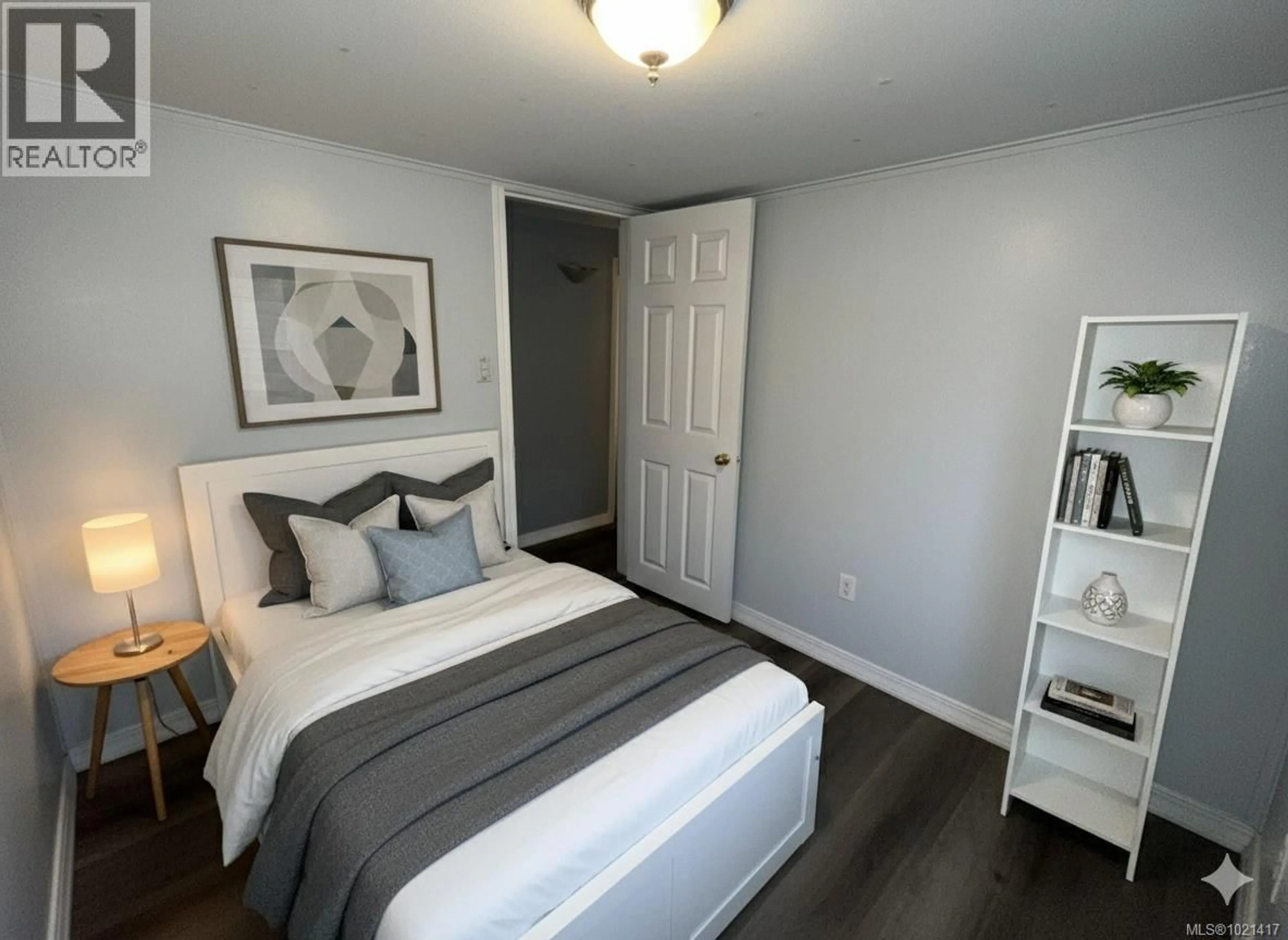 Bedroom with bed, wood/laminate floor for 6 - 2055 KOKSILAH ROAD, Duncan British Columbia V9L6E2