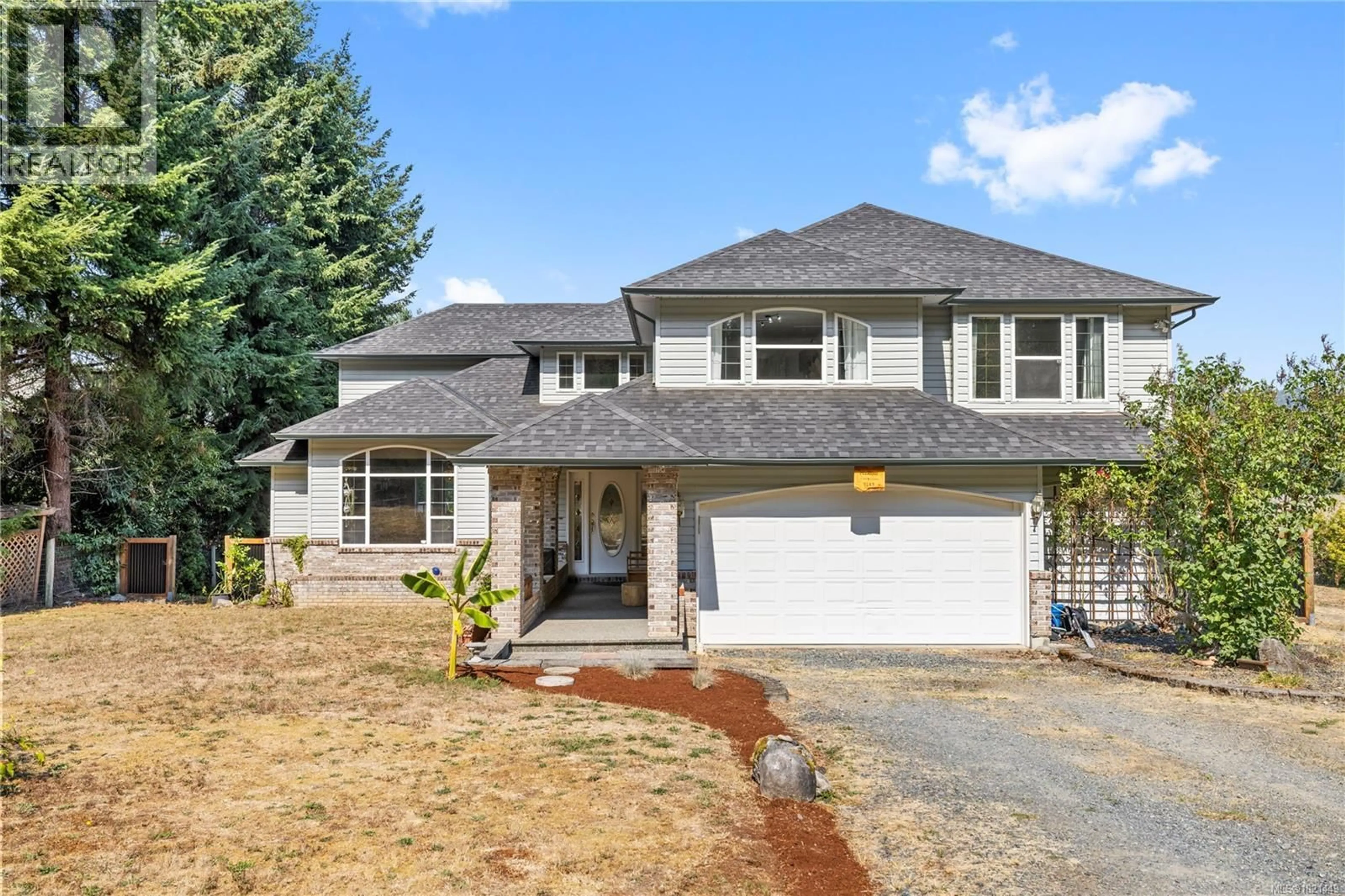 Home with vinyl exterior material, street for 5145 GROUHEL ROAD, Ladysmith British Columbia V9G1J4