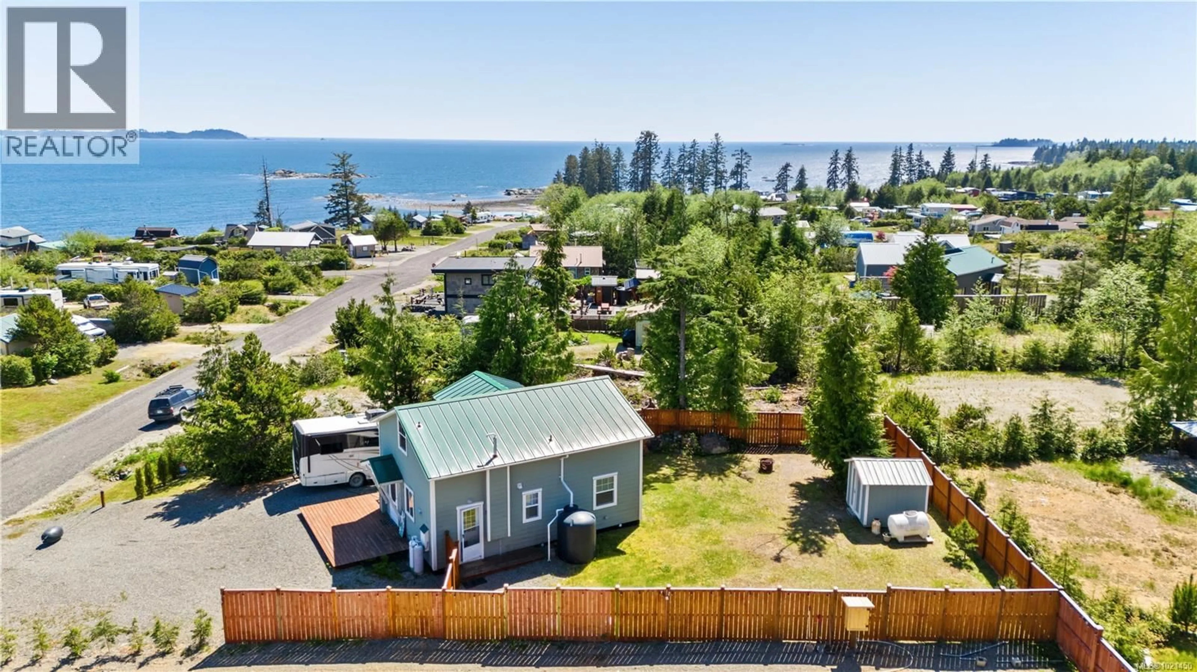 A pic from outside/outdoor area/front of a property/back of a property/a pic from drone, water/lake/river/ocean view for 1129 FIFTH AVENUE, Ucluelet British Columbia V0R3A0
