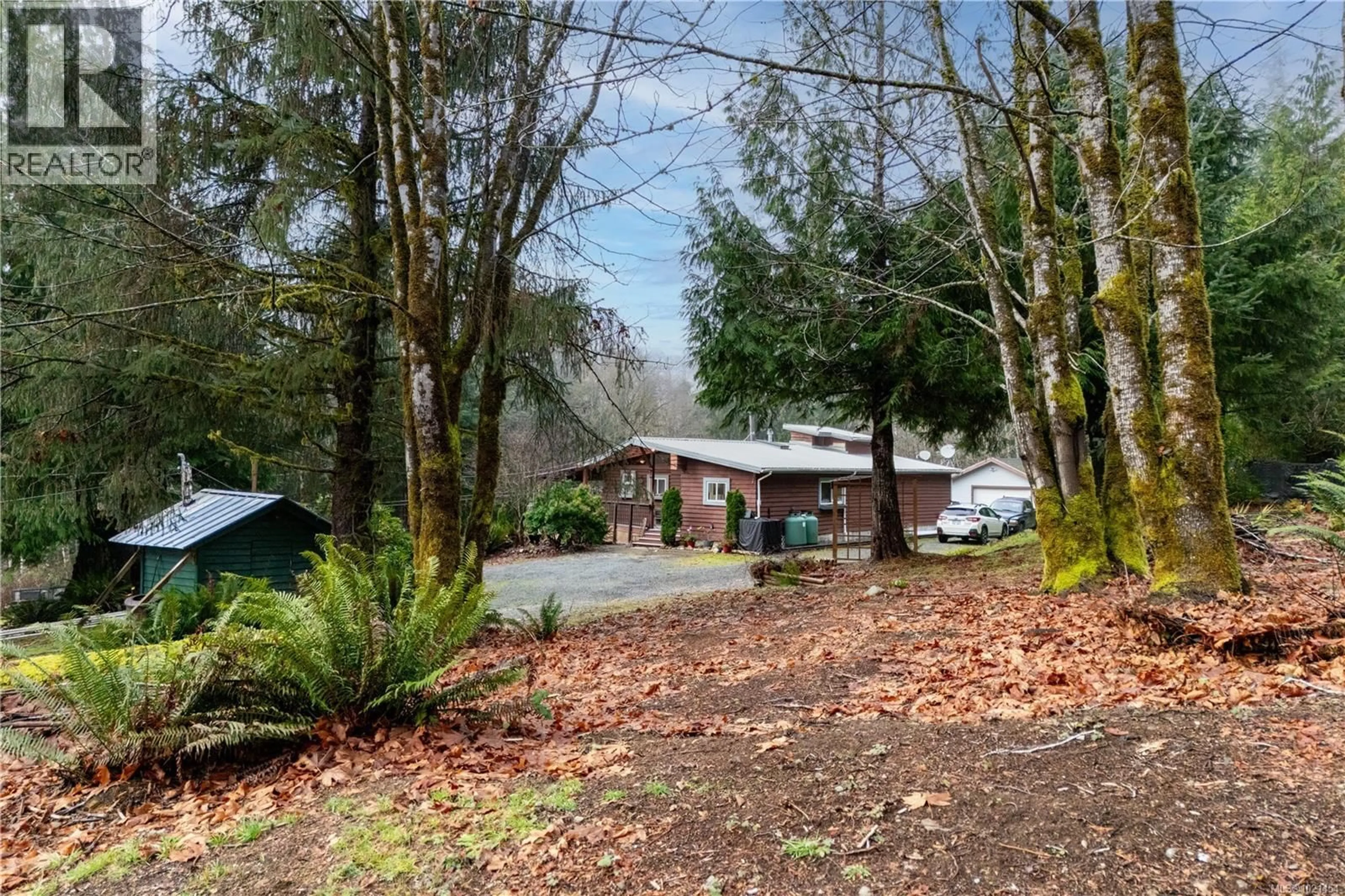 A pic from outside/outdoor area/front of a property/back of a property/a pic from drone, unknown for 1877 MOUNTVIEW DRIVE, Sayward British Columbia V0P1R0