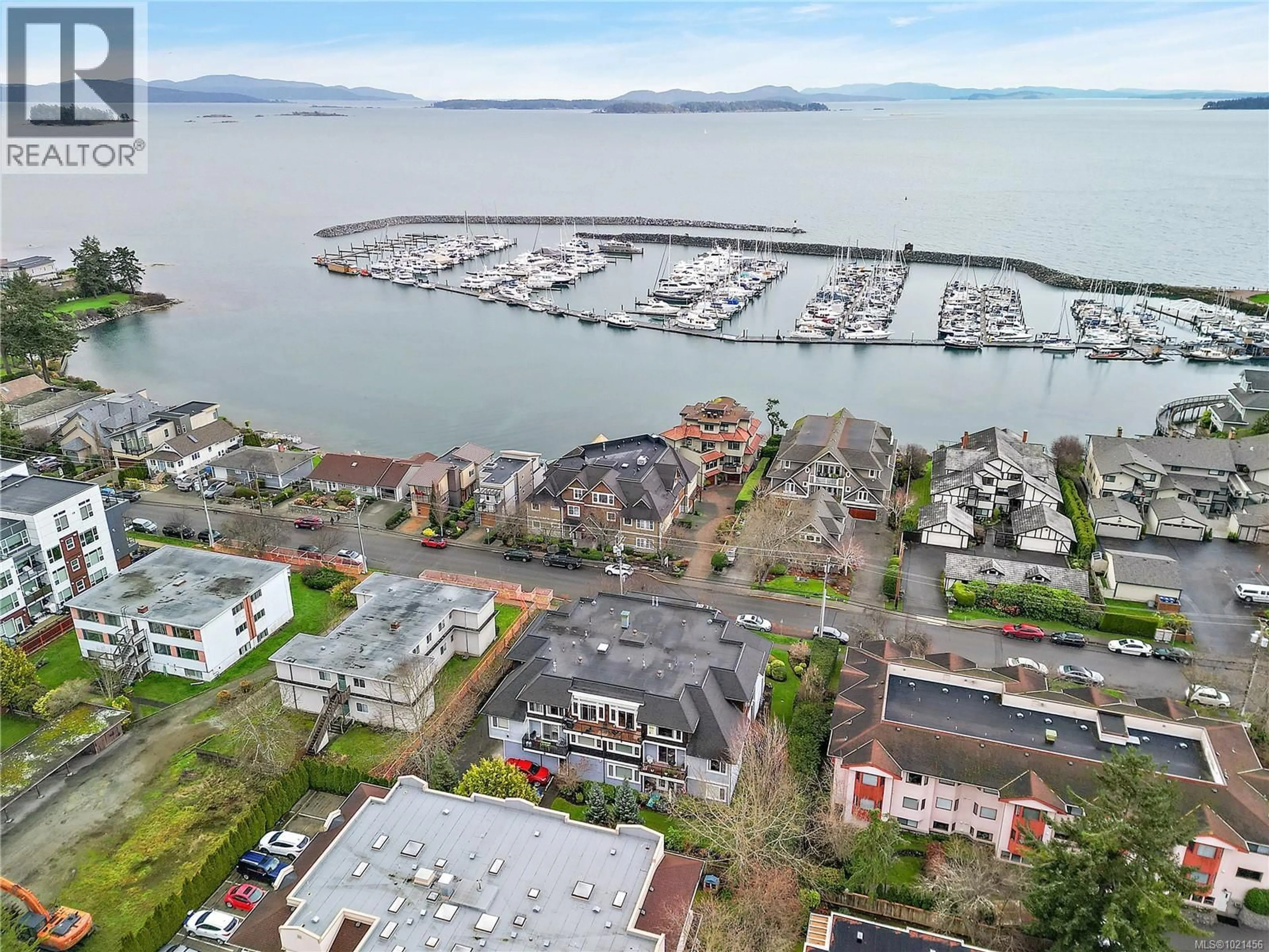 A pic from outside/outdoor area/front of a property/back of a property/a pic from drone, water/lake/river/ocean view for 303 - 9942 THIRD STREET, Sidney British Columbia V8L3B2