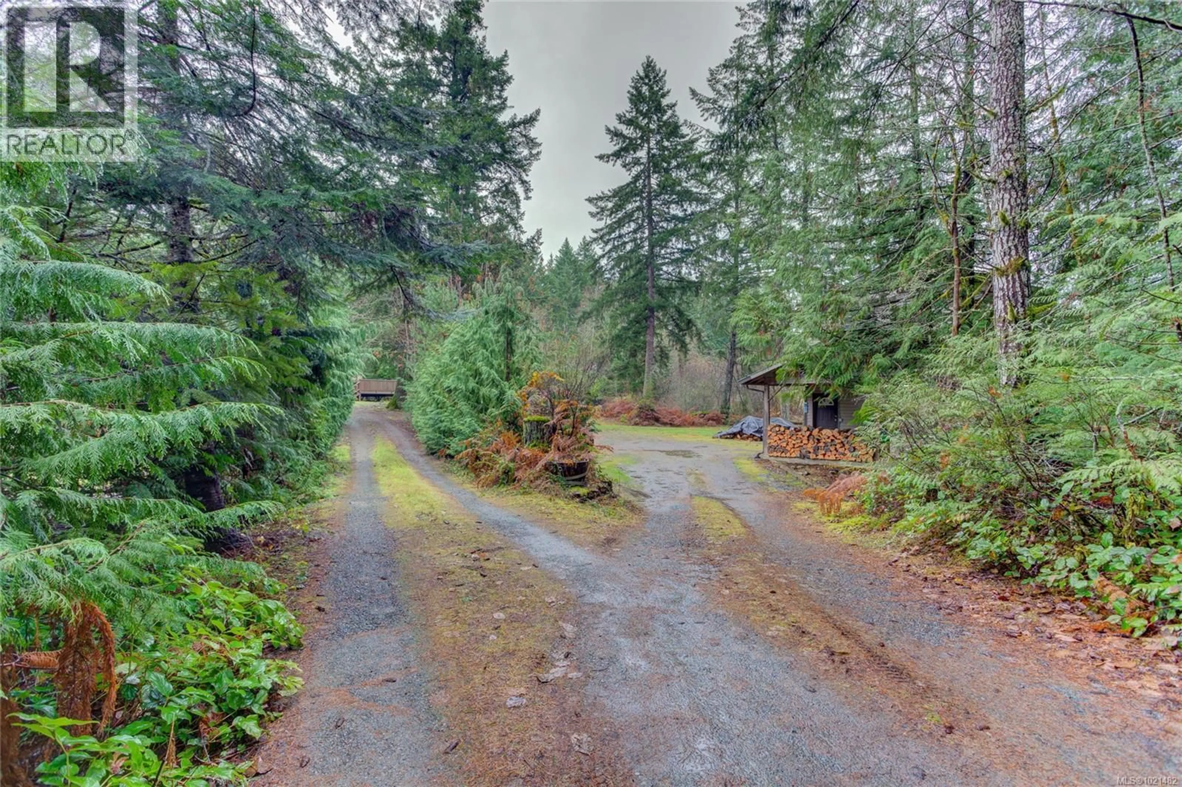 A pic from outside/outdoor area/front of a property/back of a property/a pic from drone, forest/trees view for 4305 SUNRISE ROAD, Duncan British Columbia V9L6G6