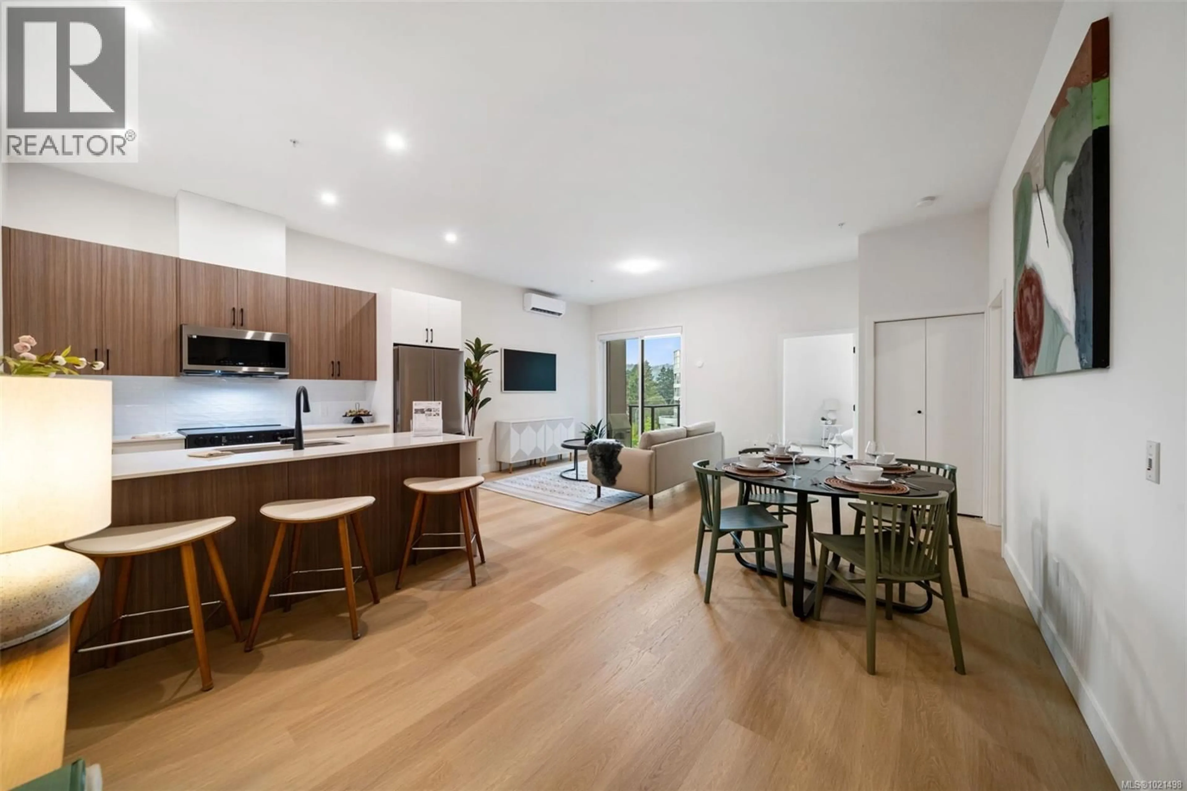 Open concept kitchen, wood/laminate floor for 506 - 2770 WINSTER ROAD, Langford British Columbia V9B7C7