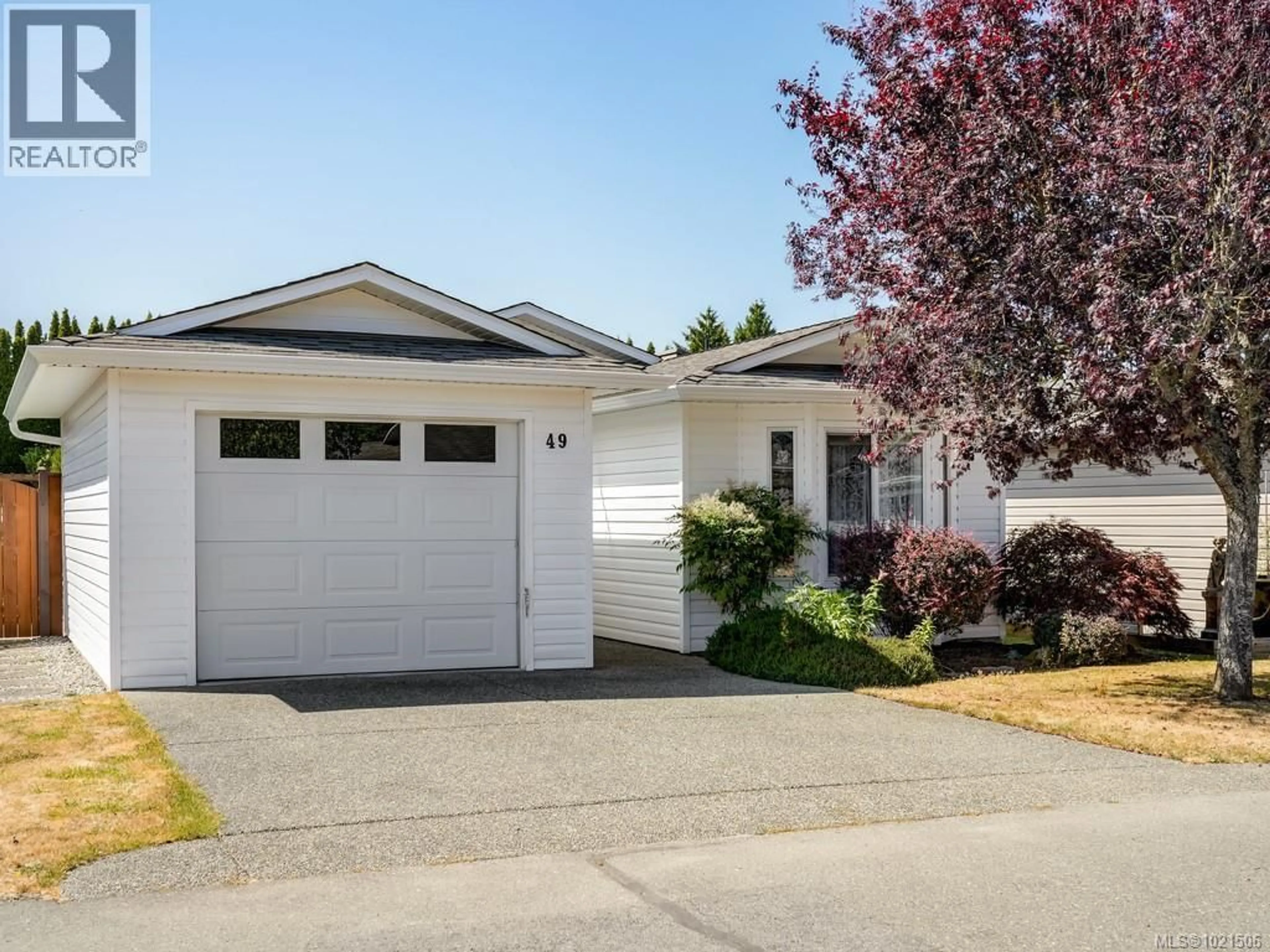 Home with vinyl exterior material, street for 49 - 7570 TETAYUT ROAD, Central Saanich British Columbia V8M2H4