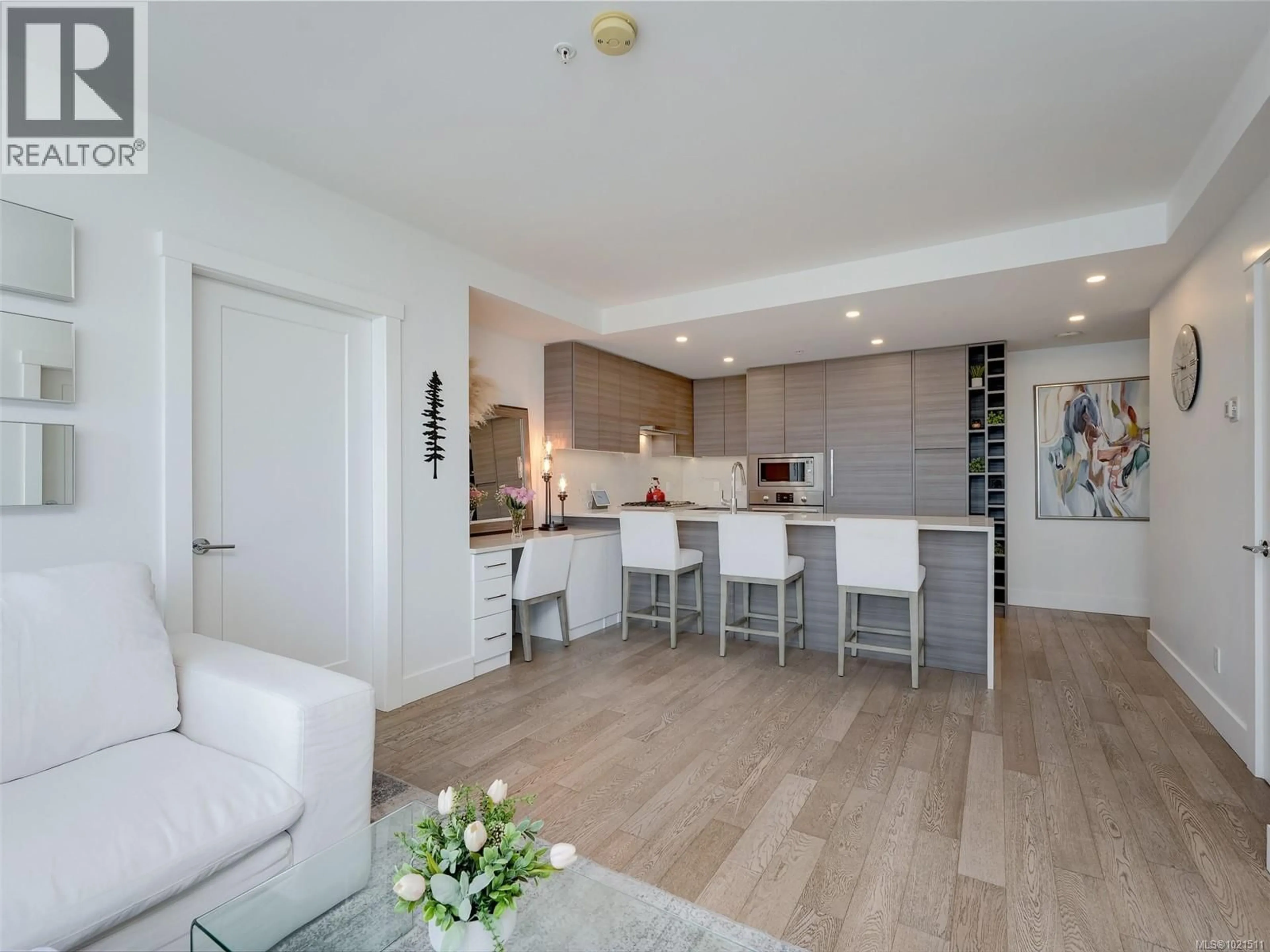 Open concept kitchen, wood/laminate floor for 2103 - 777 HERALD STREET, Victoria British Columbia V8T0C7