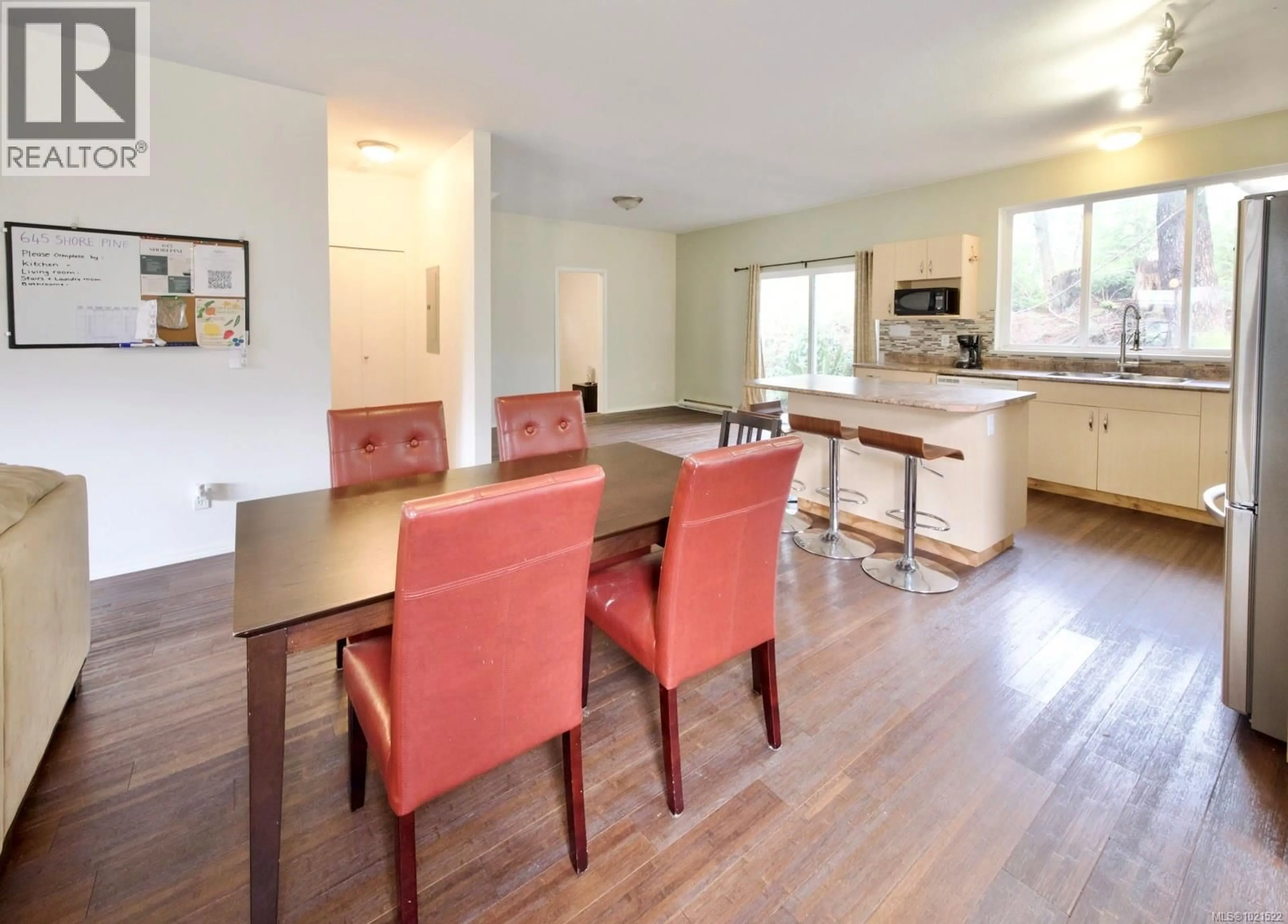 Dining room, wood/laminate floor for 645 SHORE PINE CRESCENT, Tofino British Columbia V0R2Z0