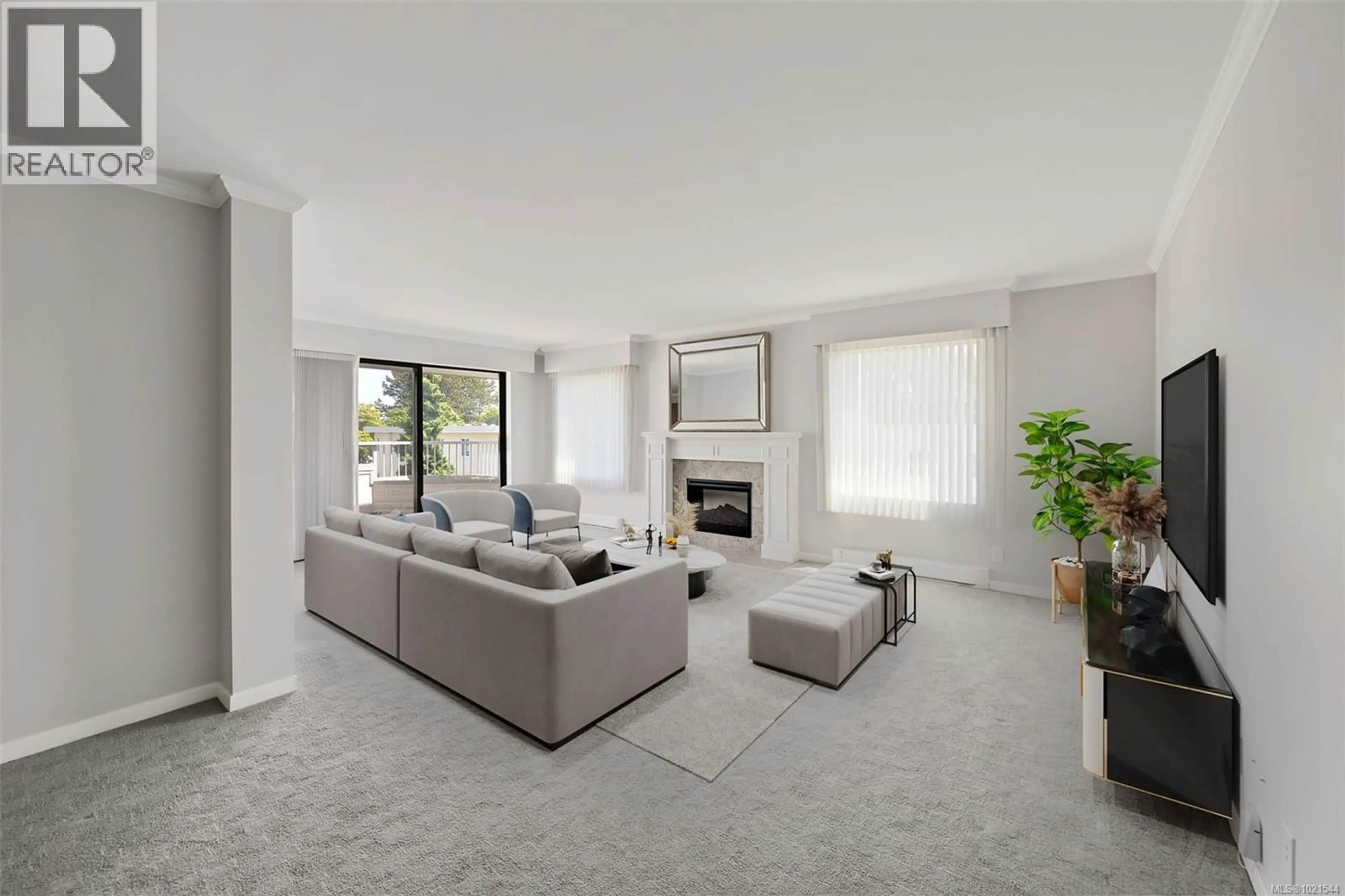 Living room with furniture, carpet floor for 409 - 1370 BEACH DRIVE, Oak Bay British Columbia V8S2N6