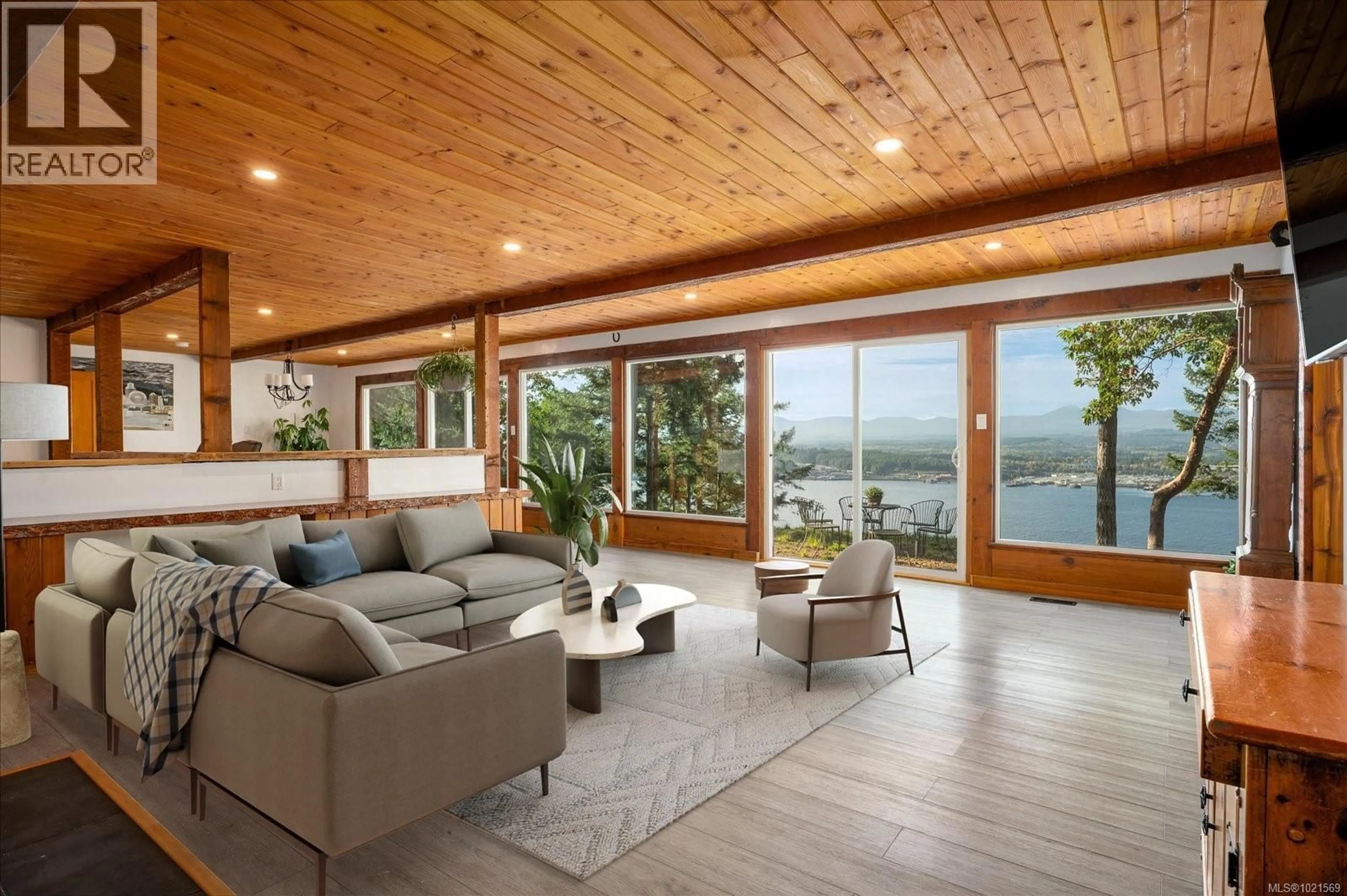 Living room with furniture, wood/laminate floor for 1306 HARRISON WAY, Gabriola Island British Columbia V0R1X2