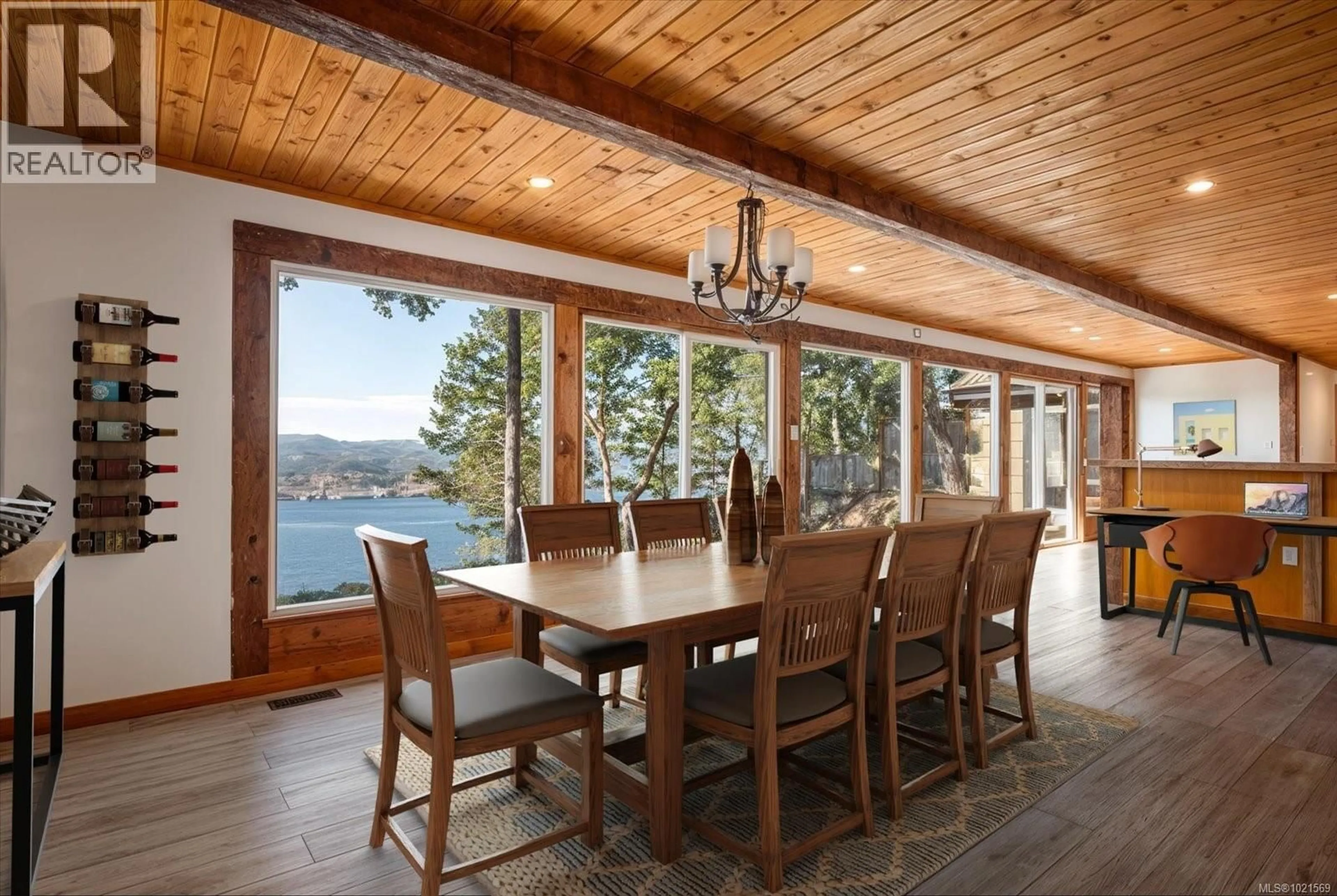 Dining room, wood/laminate floor for 1306 HARRISON WAY, Gabriola Island British Columbia V0R1X2