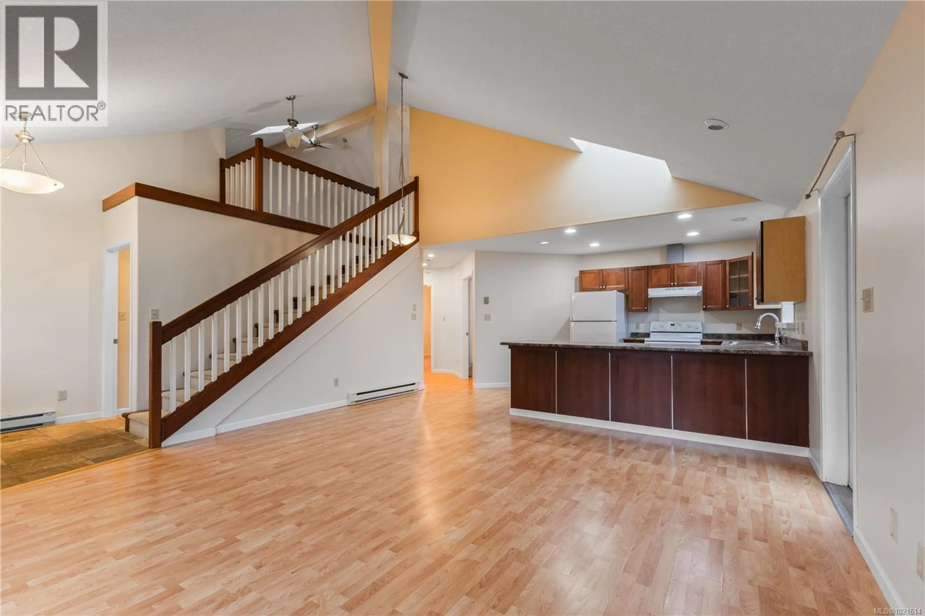 Open concept kitchen, wood/laminate floor for 1126 18TH STREET, Courtenay British Columbia V9N7J8