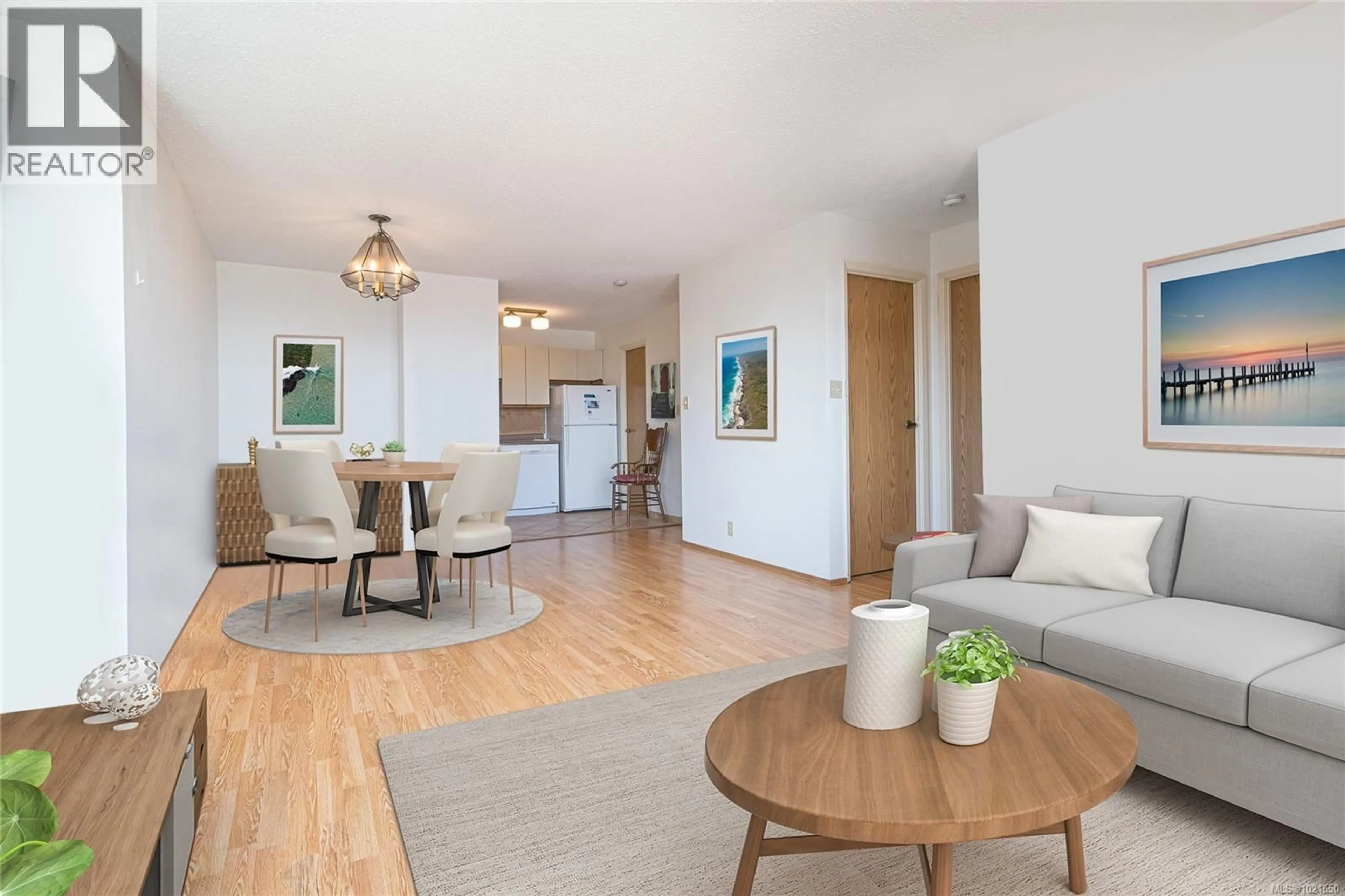 Living room with furniture, wood/laminate floor for 809 - 1630 QUADRA STREET, Victoria British Columbia V8W3J5