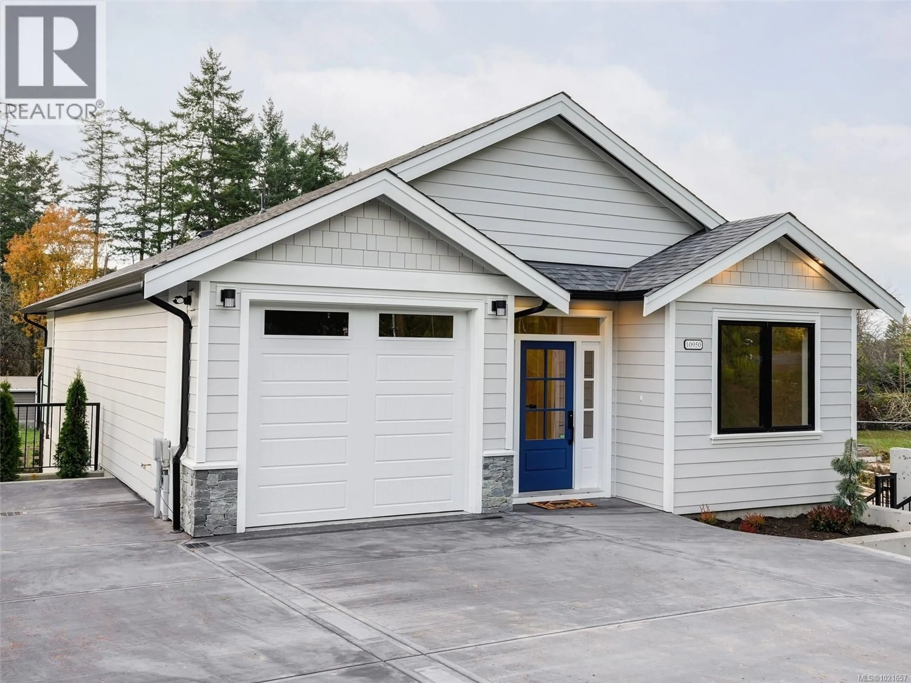 Home with vinyl exterior material, street for 10950 CHALET ROAD, North Saanich British Columbia V8L5M2