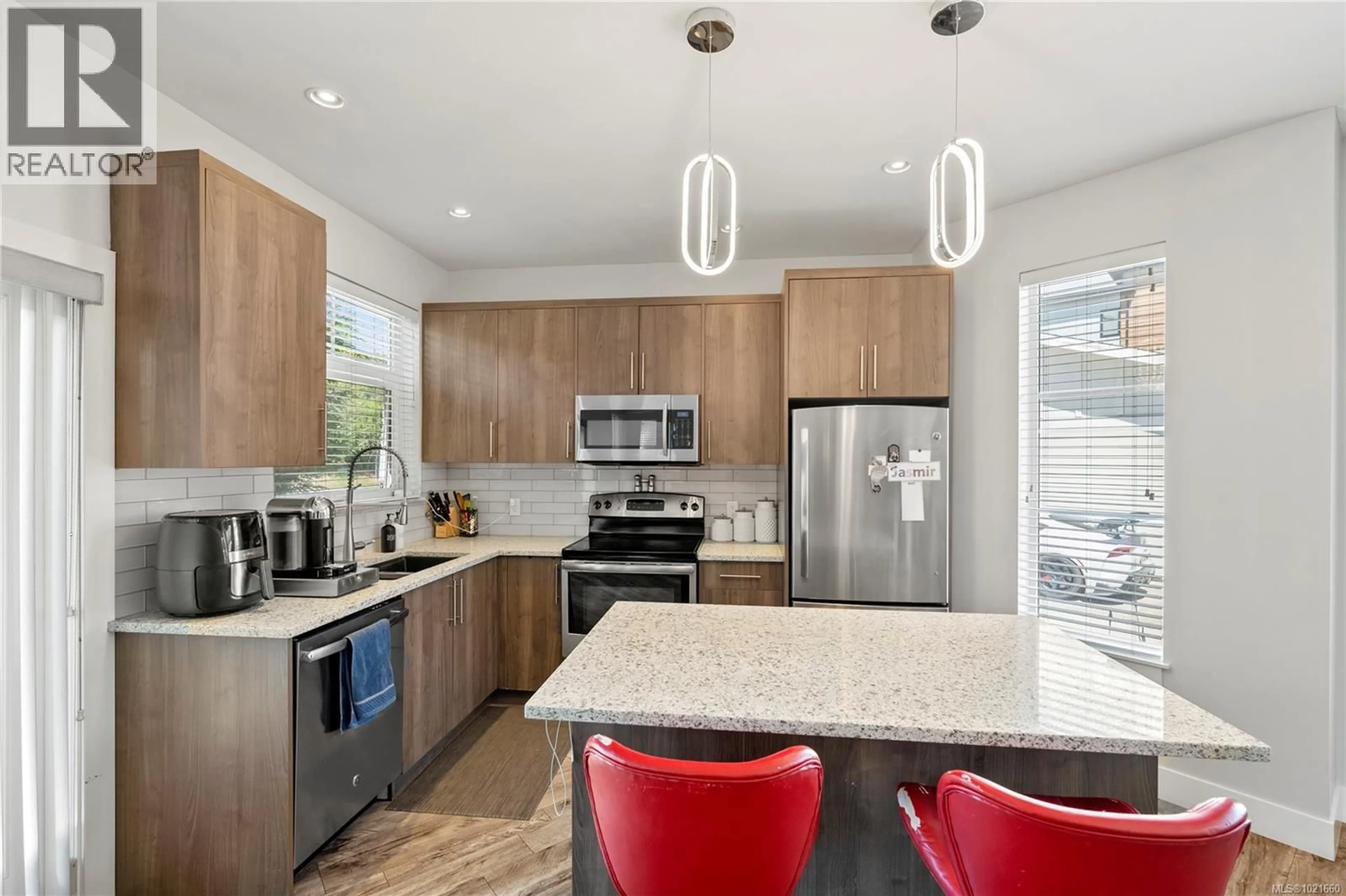 Open concept kitchen, unknown for 701 STRANDLUND AVENUE, Langford British Columbia V9B3G2