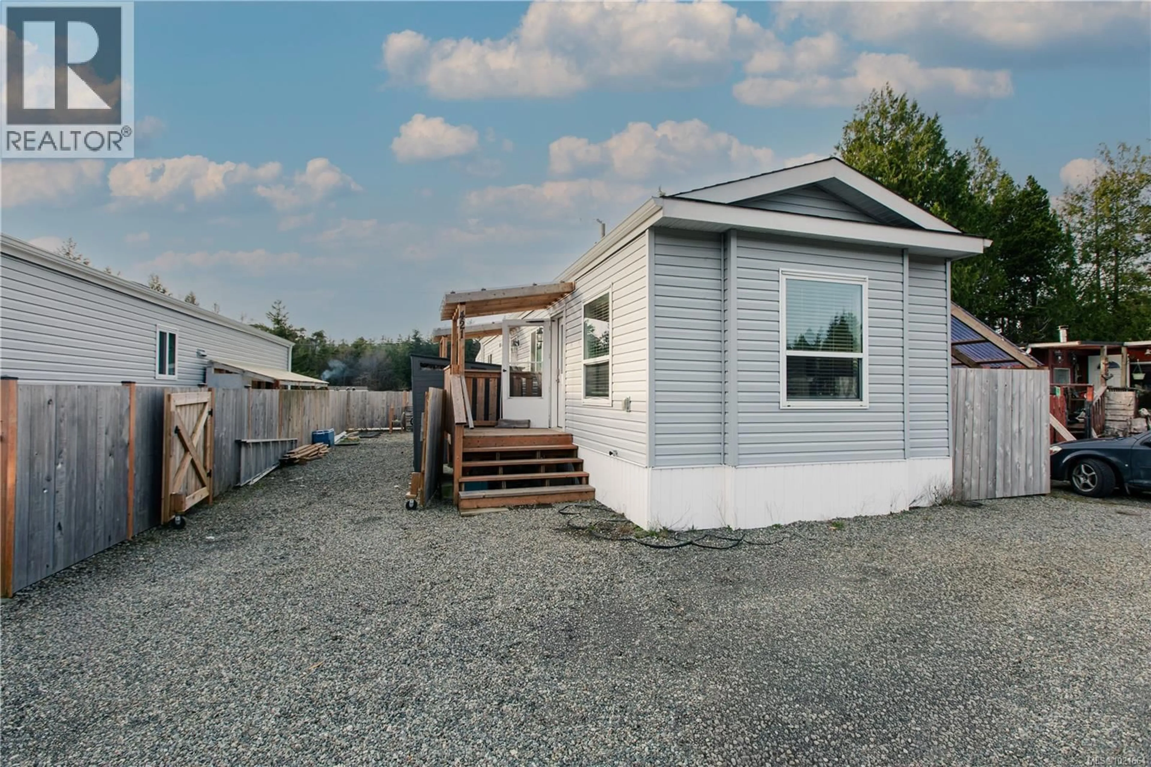 Home with vinyl exterior material, street for 421 HUMPBACK PLACE, Ucluelet British Columbia V0R3A0