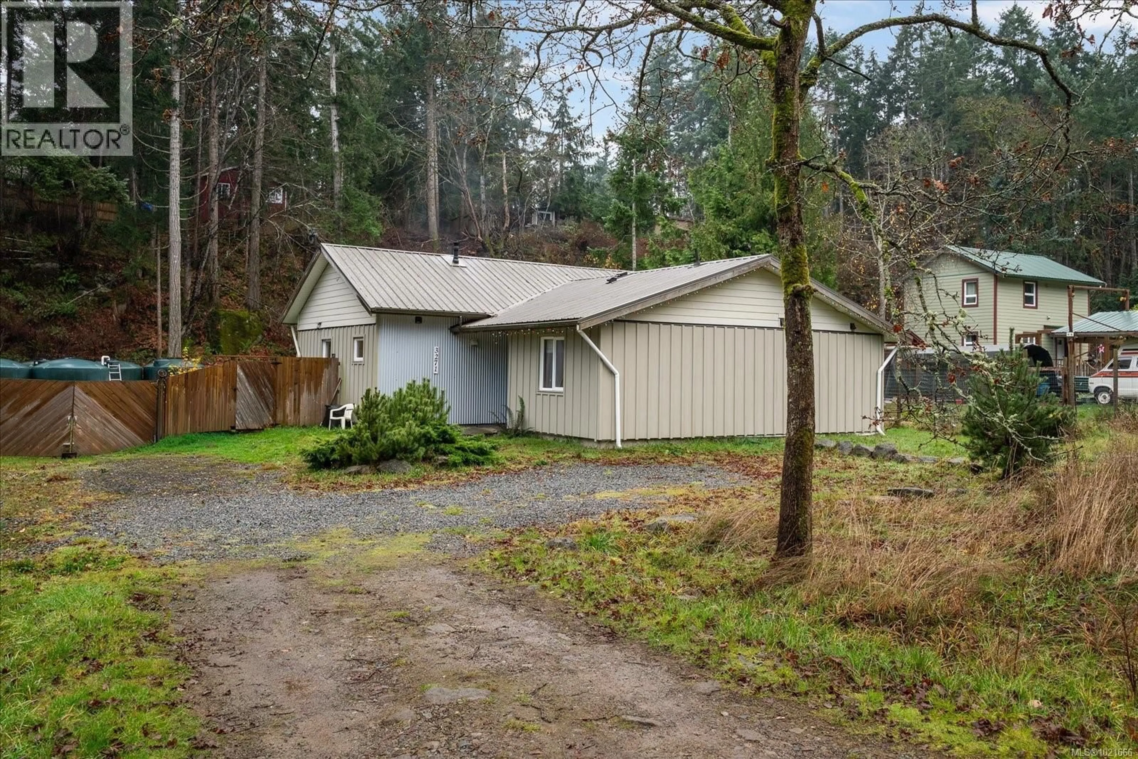 A pic from outside/outdoor area/front of a property/back of a property/a pic from drone, forest/trees view for 3271 SOUTH ROAD, Gabriola Island British Columbia V0R1X7