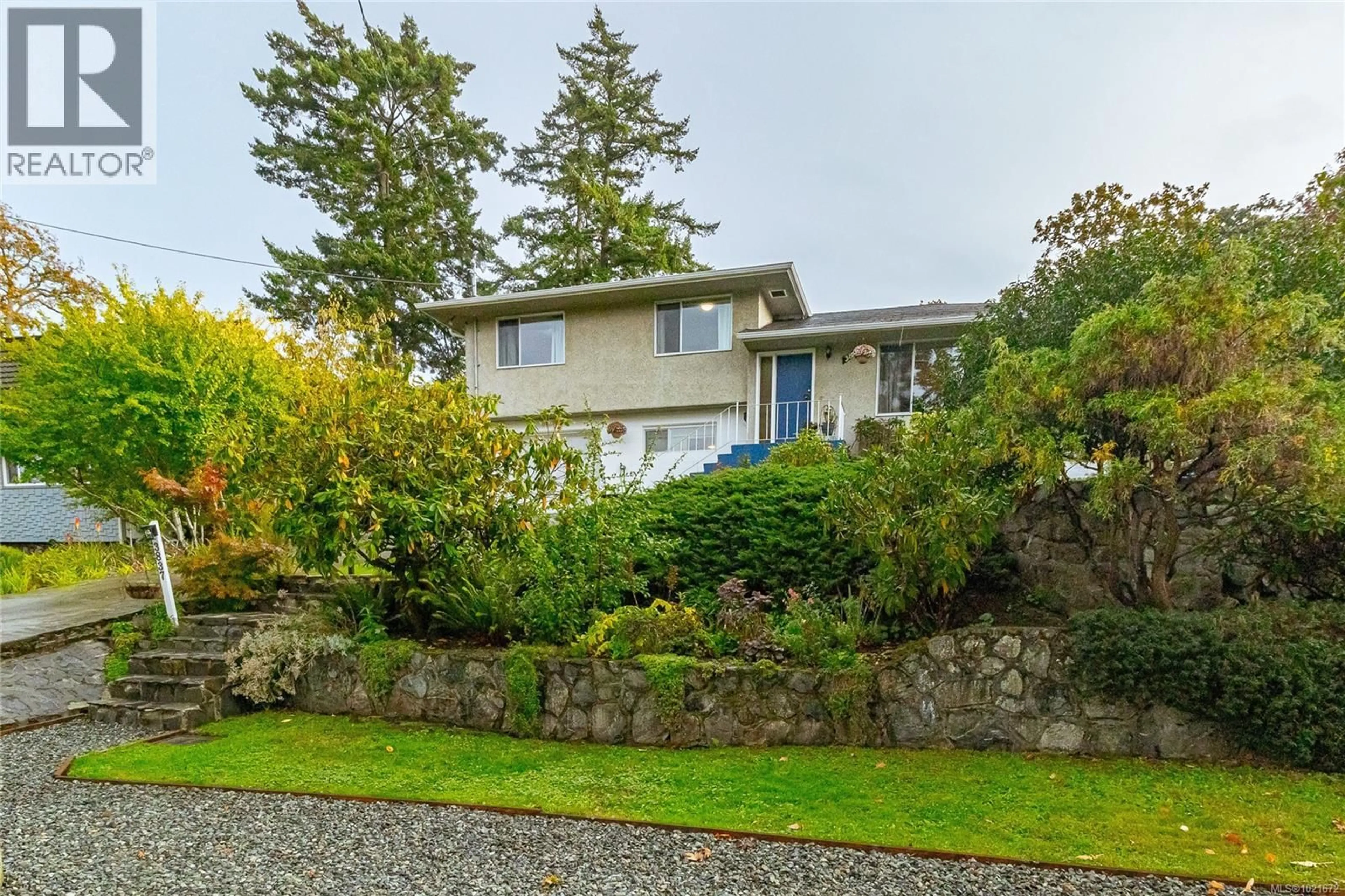 A pic from outside/outdoor area/front of a property/back of a property/a pic from drone, street for 3837 WILKINSON ROAD, Saanich British Columbia V8Z5A3