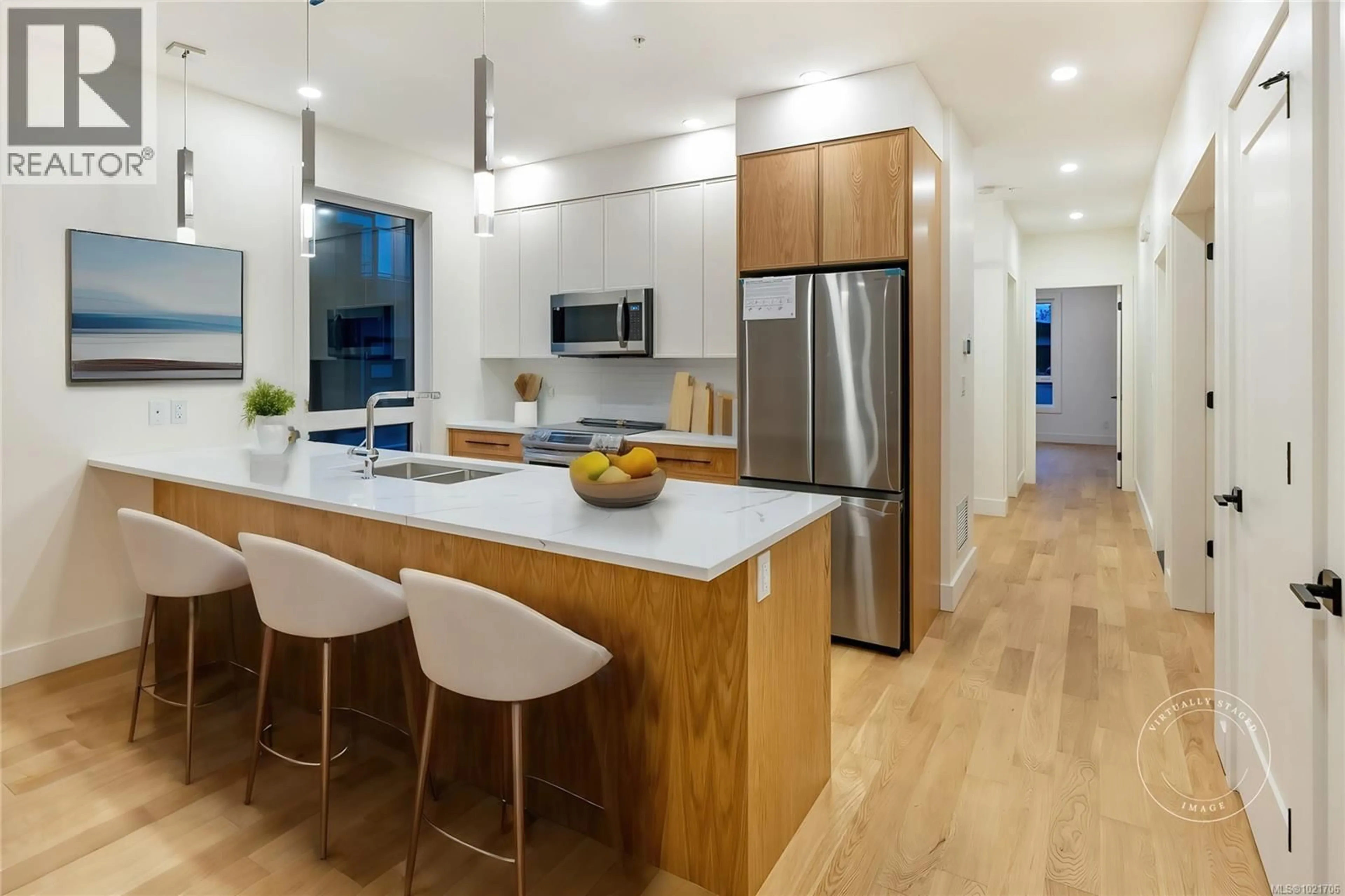 Open concept kitchen, wood/laminate floor for 116 - 463 HIRST AVENUE, Parksville British Columbia V9P1J2