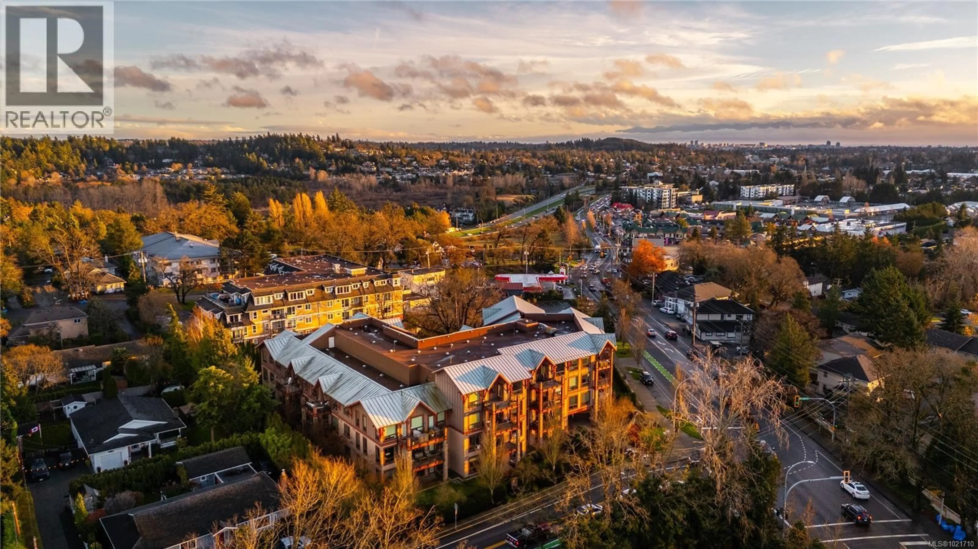 A pic from outside/outdoor area/front of a property/back of a property/a pic from drone, unknown for 103 - 4529 WEST SAANICH ROAD, Saanich British Columbia V8Z3G3