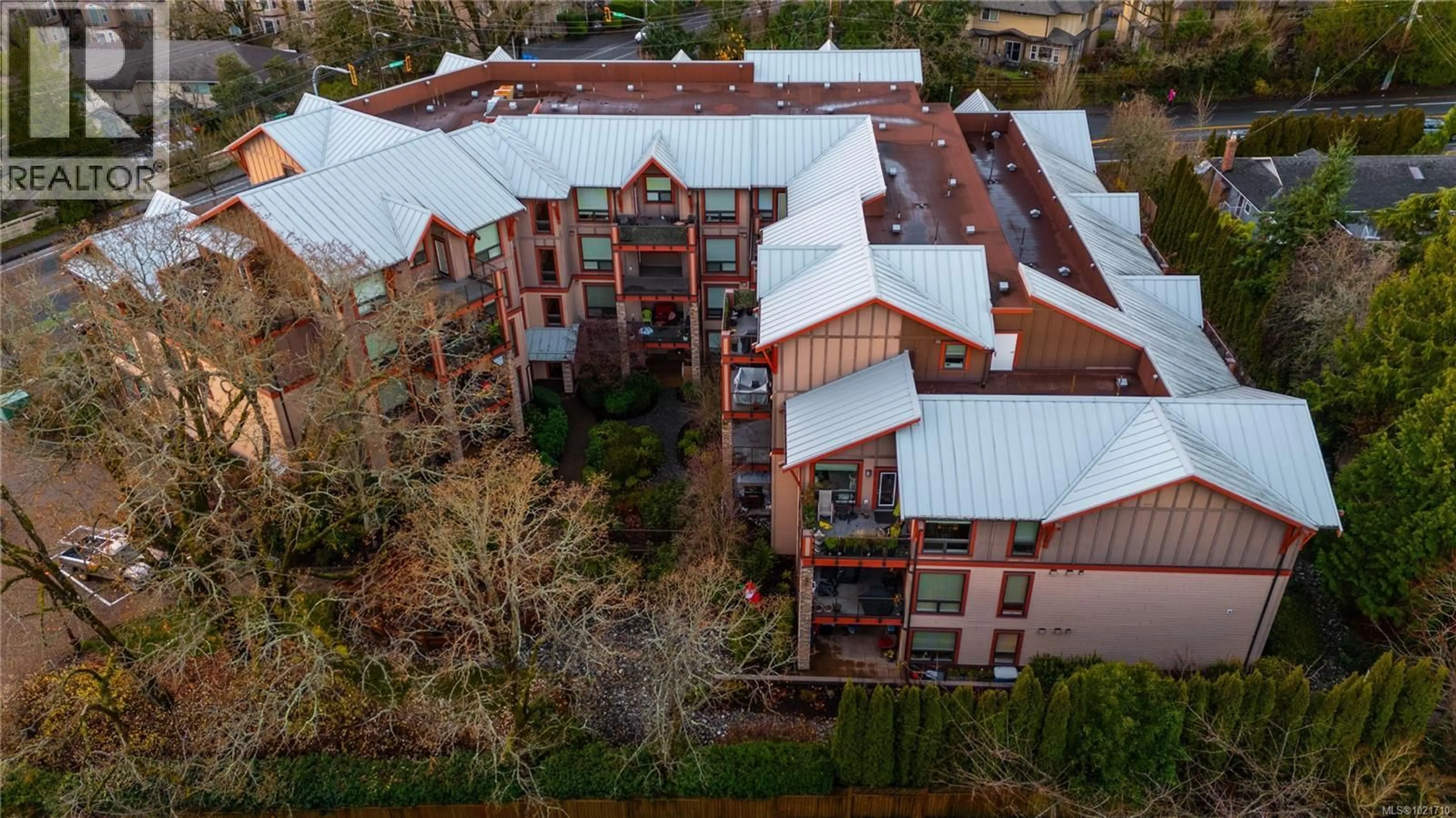 A pic from outside/outdoor area/front of a property/back of a property/a pic from drone, city buildings view from balcony for 103 - 4529 WEST SAANICH ROAD, Saanich British Columbia V8Z3G3
