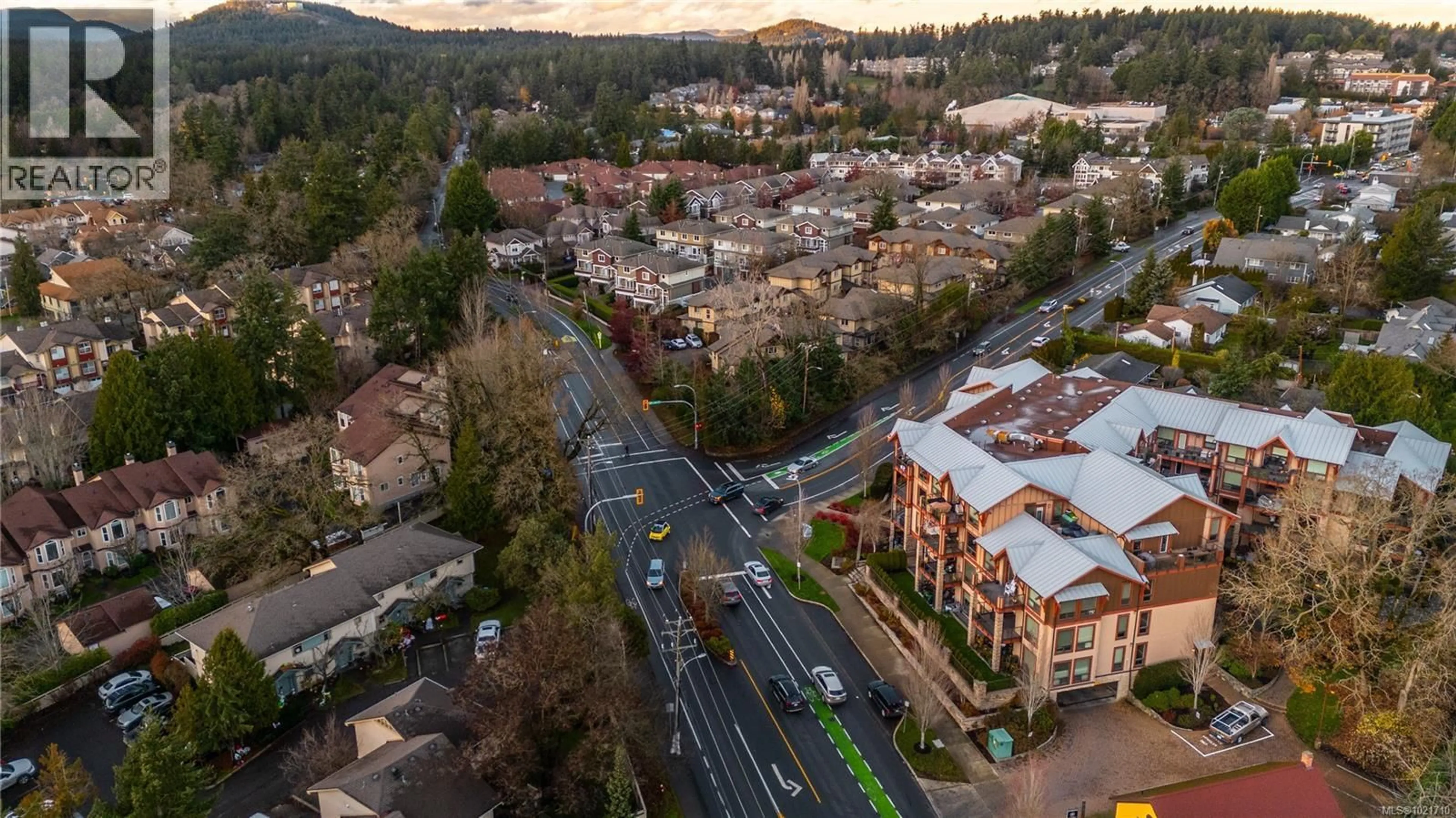 A pic from outside/outdoor area/front of a property/back of a property/a pic from drone, mountain view for 103 - 4529 WEST SAANICH ROAD, Saanich British Columbia V8Z3G3