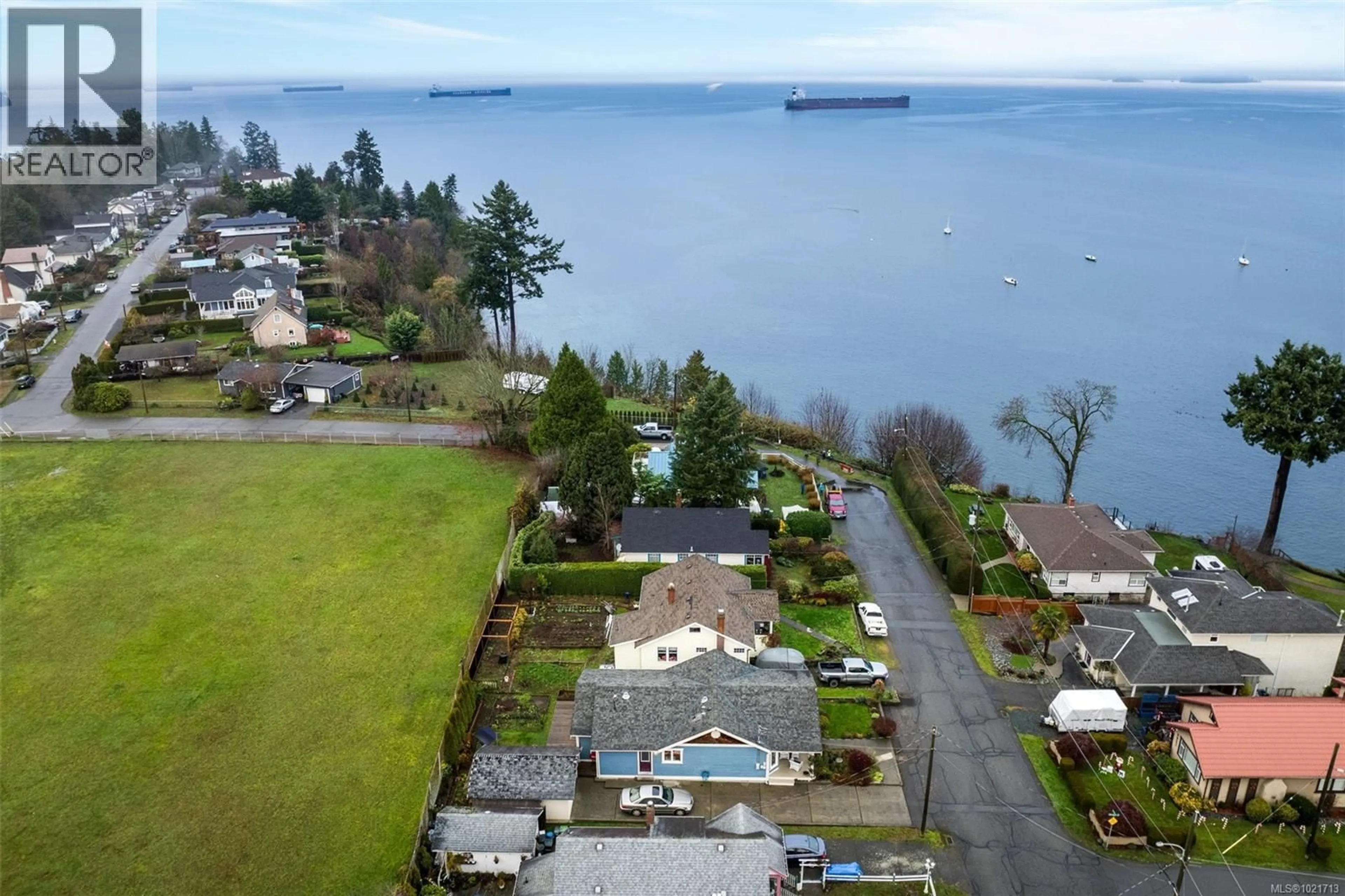 A pic from outside/outdoor area/front of a property/back of a property/a pic from drone, water/lake/river/ocean view for 9950 SEAVIEW STREET, Chemainus British Columbia V0R1K1