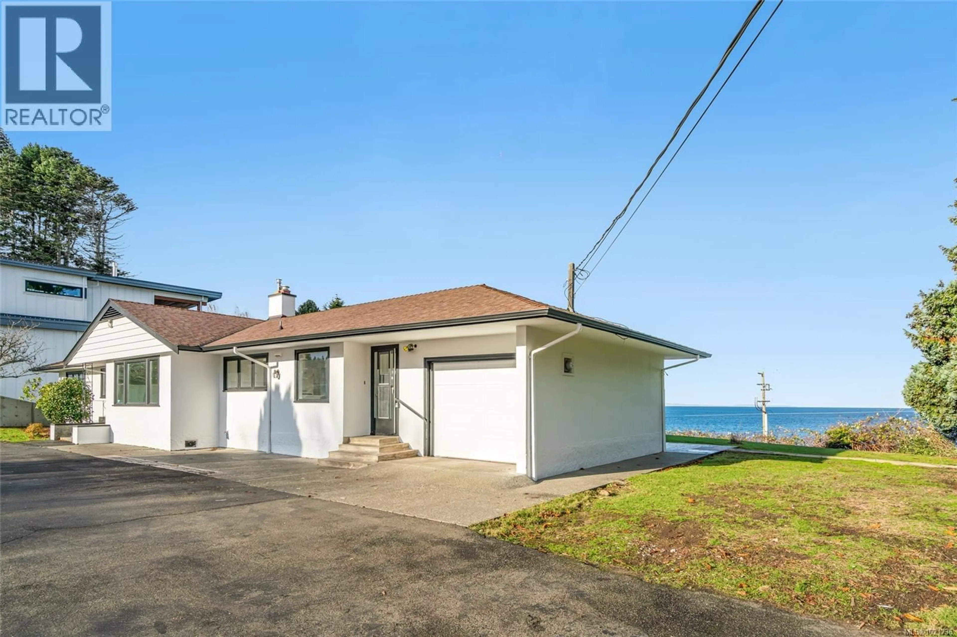 A pic from outside/outdoor area/front of a property/back of a property/a pic from drone, water/lake/river/ocean view for 441 MEMORIAL AVENUE, Qualicum Beach British Columbia V9K1G8