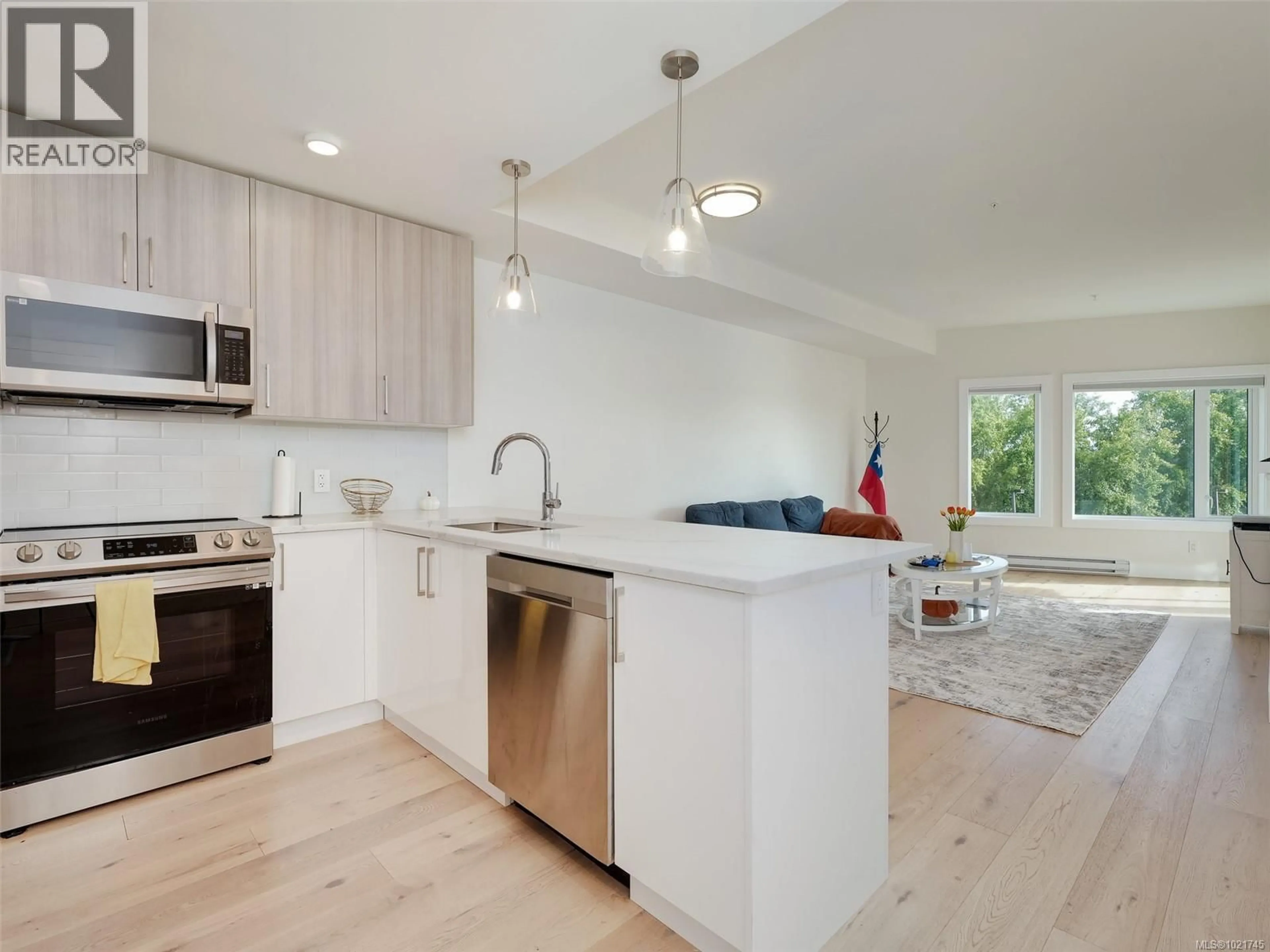 Open concept kitchen, unknown for 307 - 7098 WALLACE DRIVE, Central Saanich British Columbia V8M1G9
