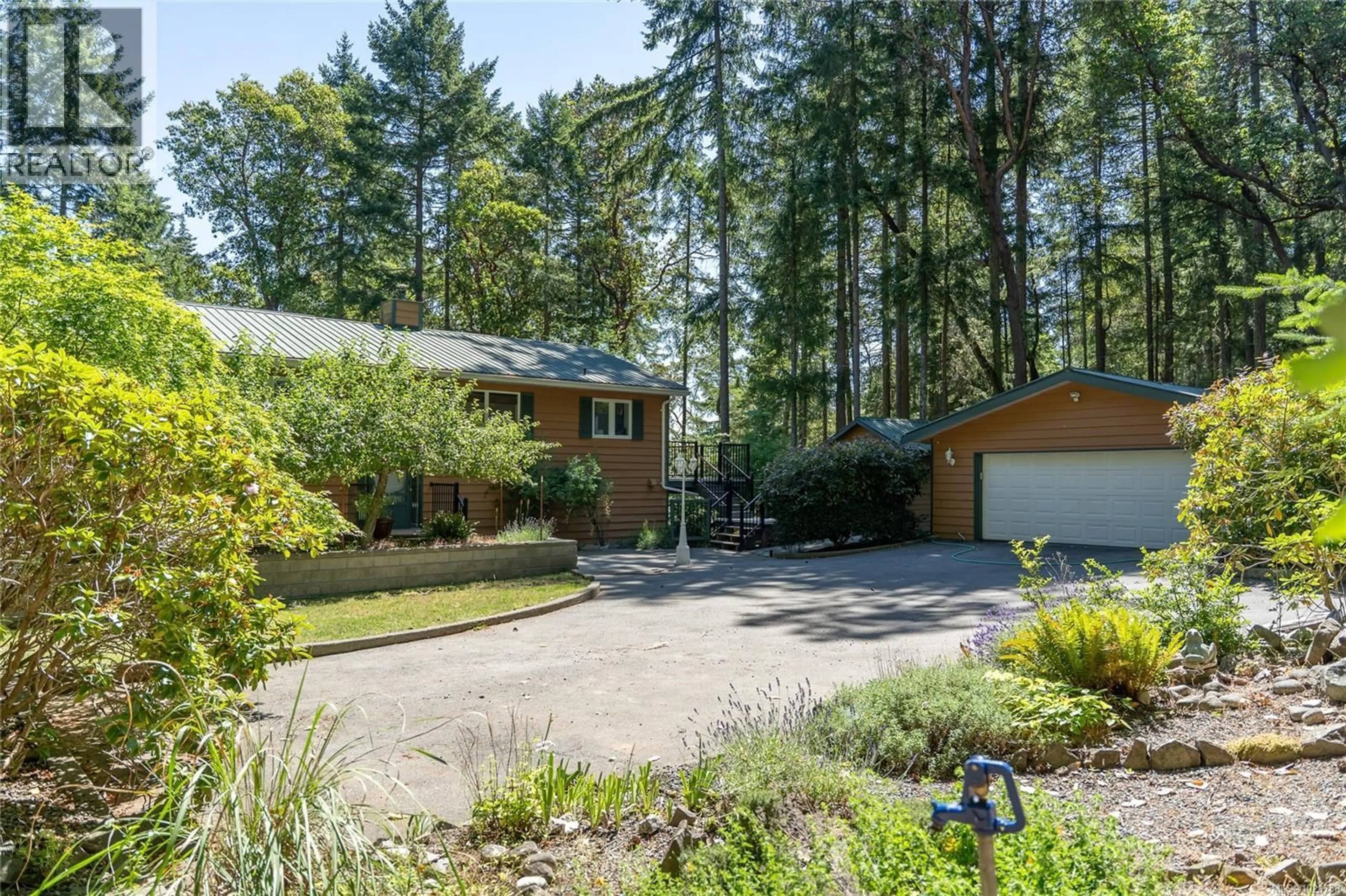 A pic from outside/outdoor area/front of a property/back of a property/a pic from drone, street for 149 PILKEY POINT ROAD, Thetis Island British Columbia V0R2Y0