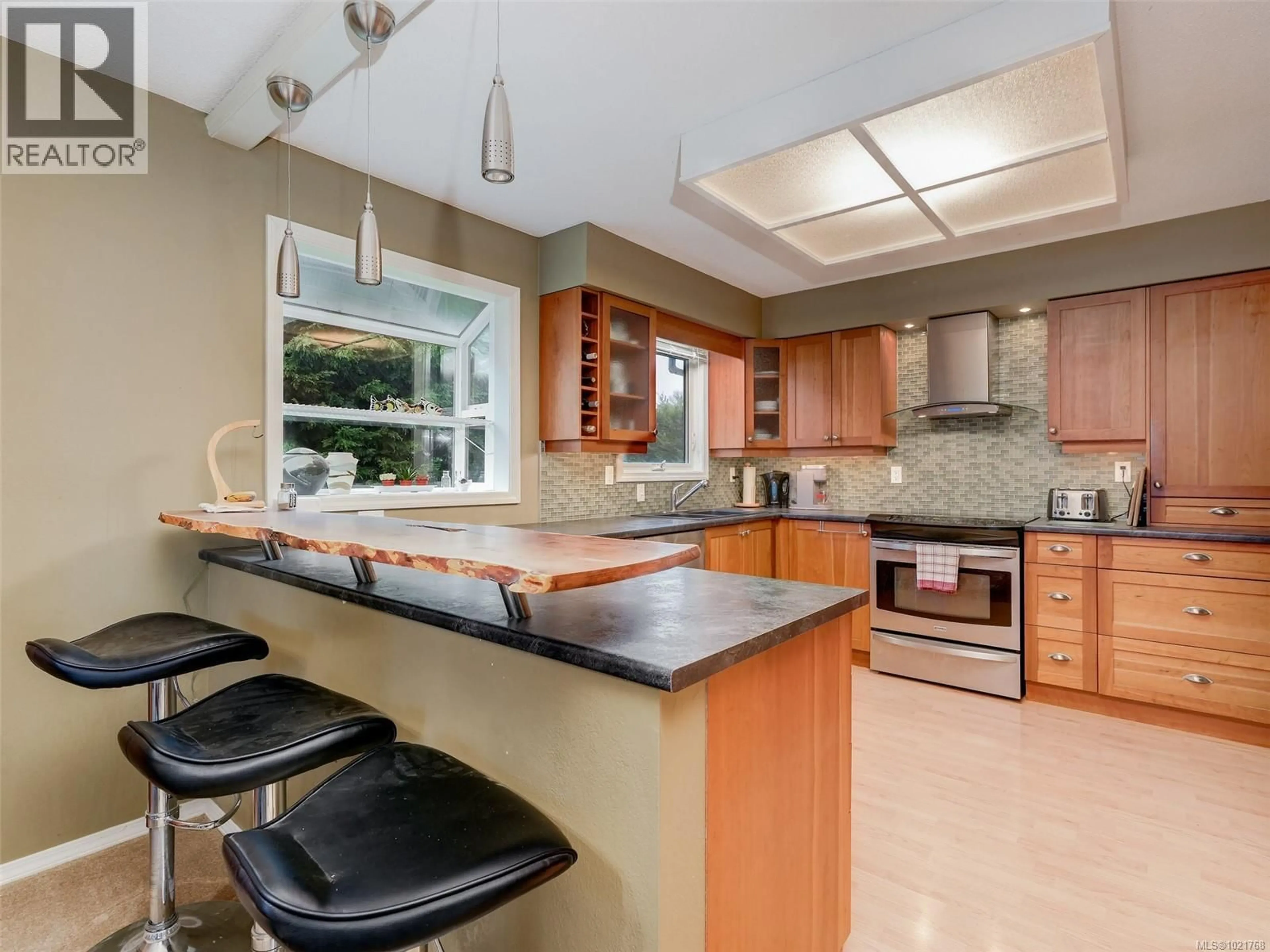Contemporary kitchen, ceramic/tile floor for 1018 DAMELART WAY, Central Saanich British Columbia V8M1H7