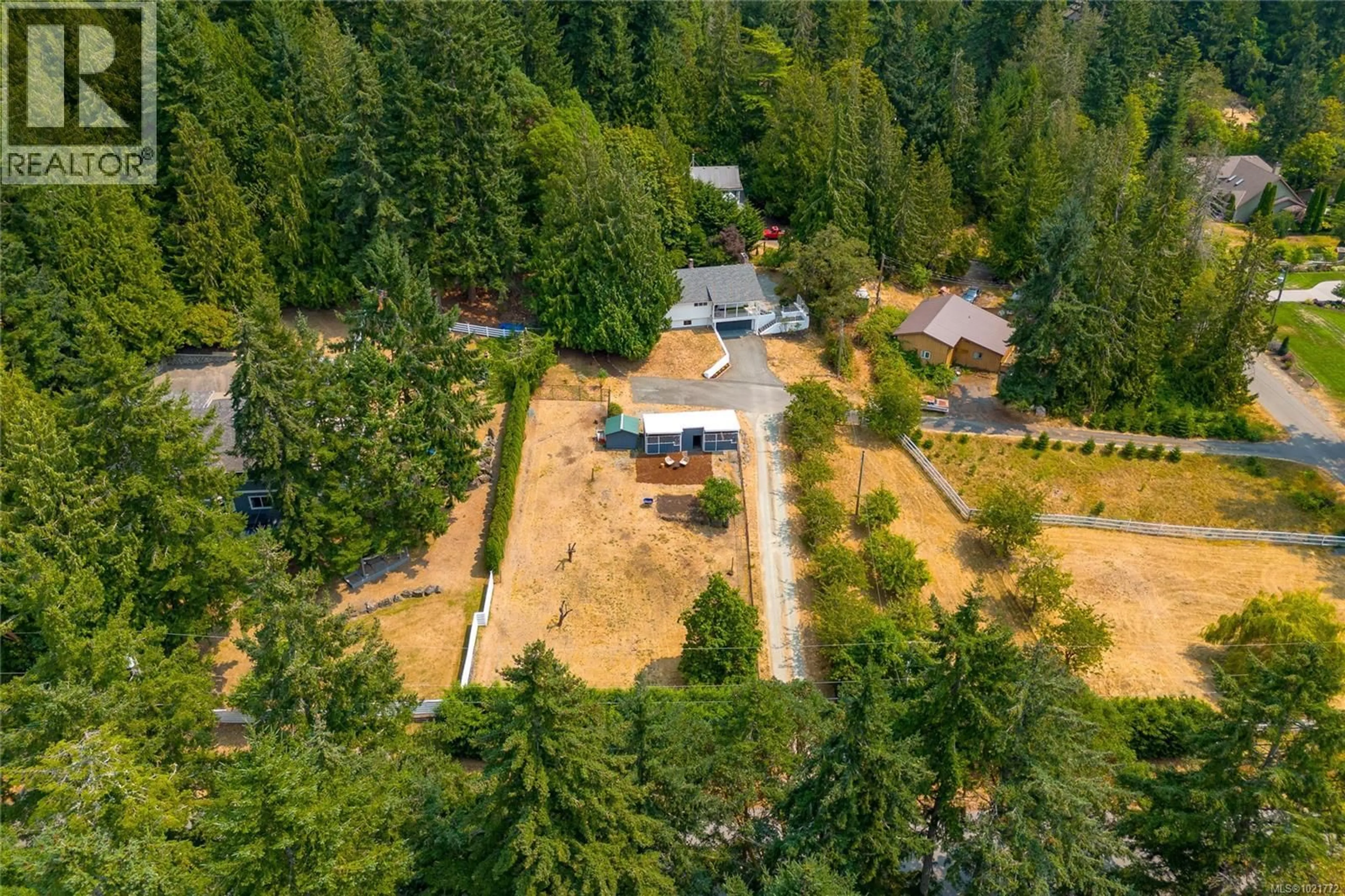 A pic from outside/outdoor area/front of a property/back of a property/a pic from drone, forest/trees view for 11255 NITINAT ROAD, North Saanich British Columbia V8L5R8