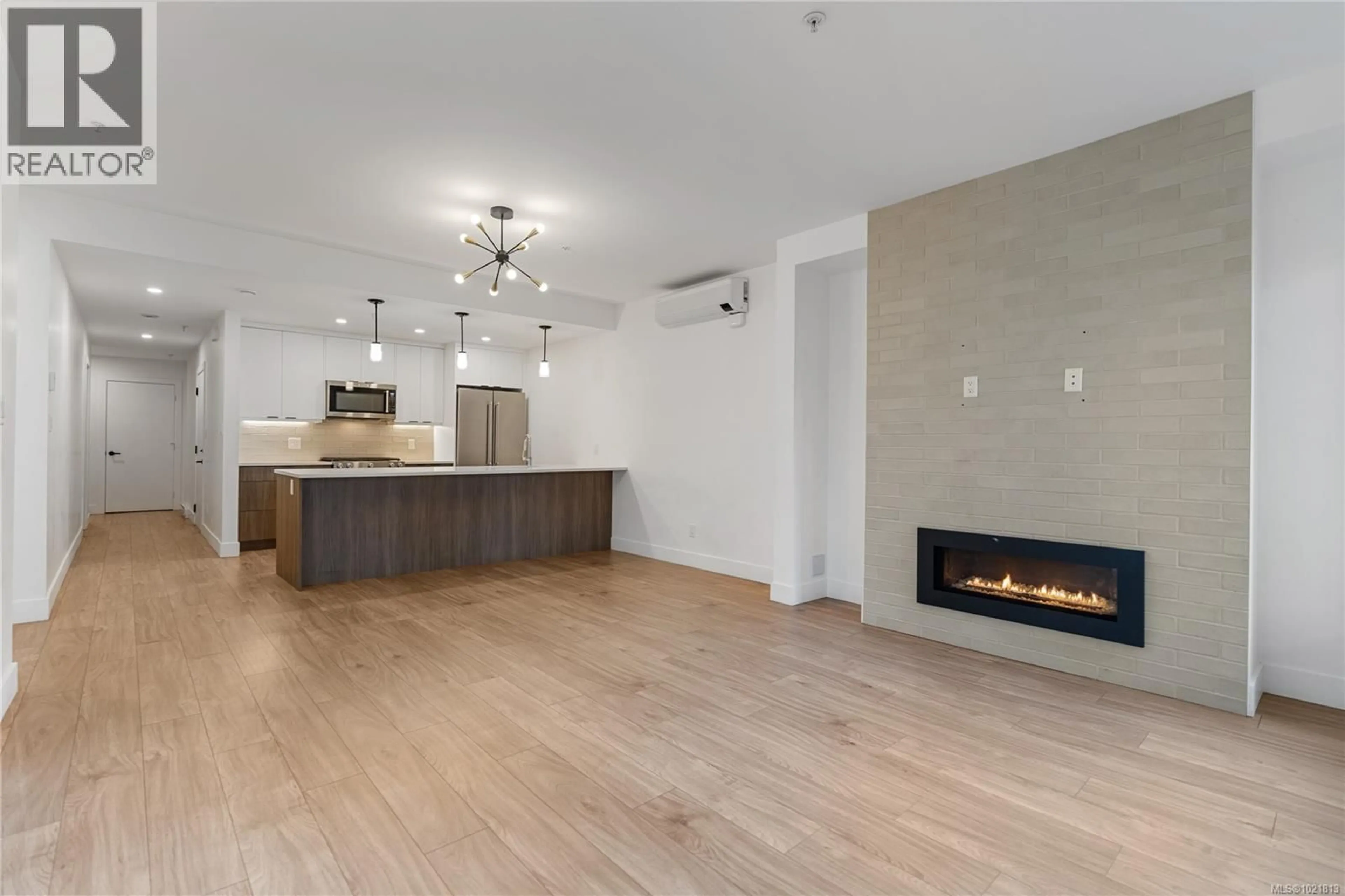 Open concept kitchen, wood/laminate floor for 8 - 2330 SOOKE ROAD, Colwood British Columbia V9B1X7