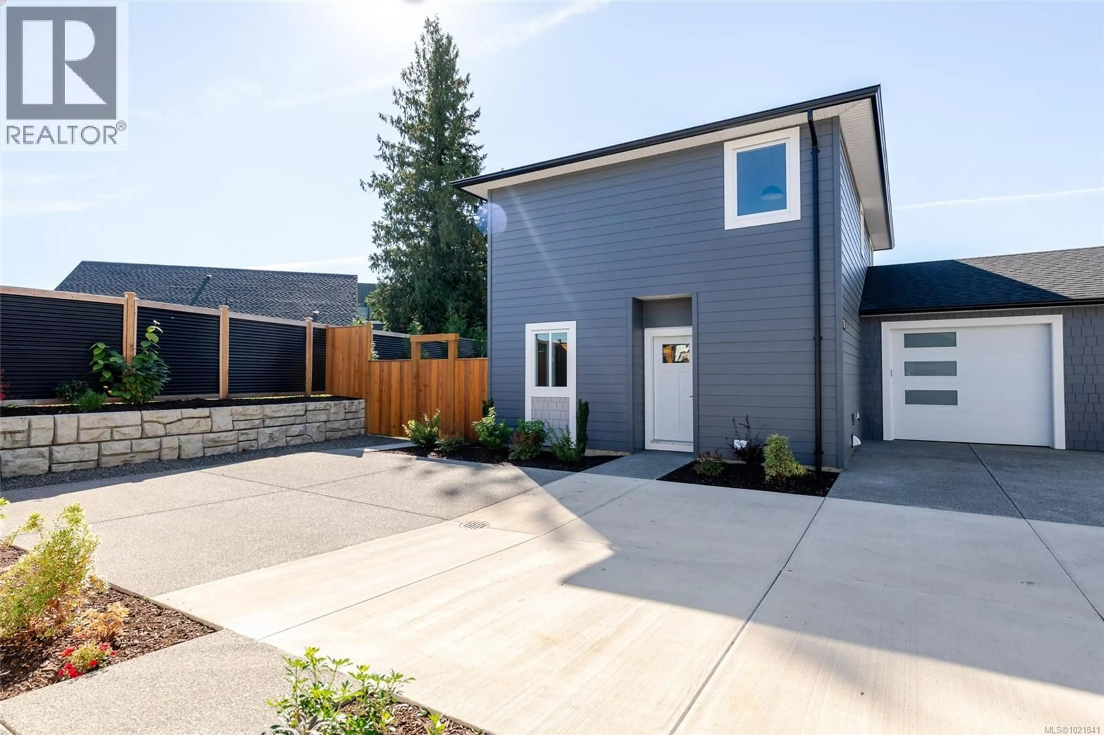 Home with vinyl exterior material, street for B - 2317 MCDONALD ROAD, Comox British Columbia V9M0C8