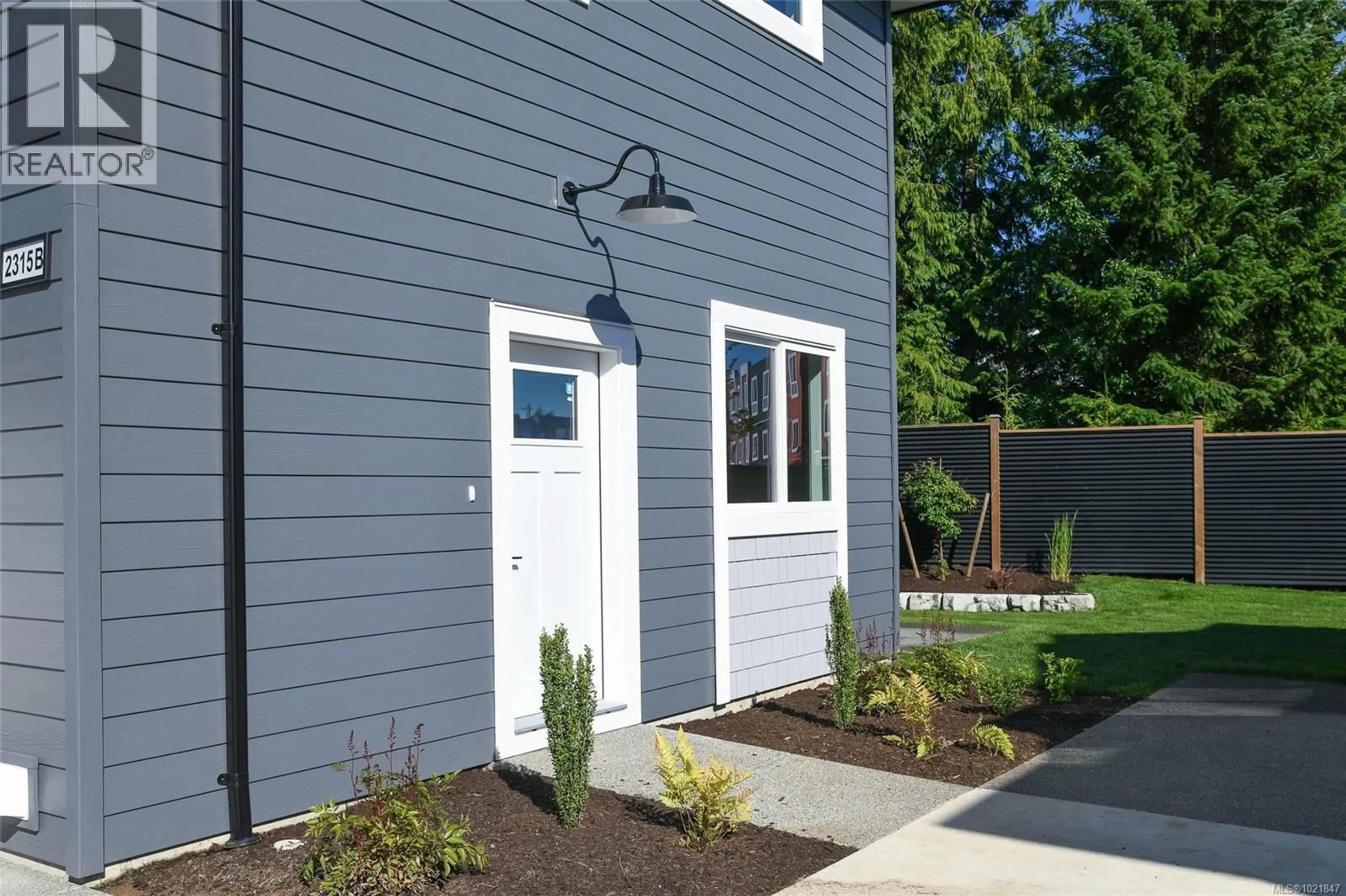 Home with vinyl exterior material, street for B - 2315 MCDONALD ROAD, Comox British Columbia V9M0C8