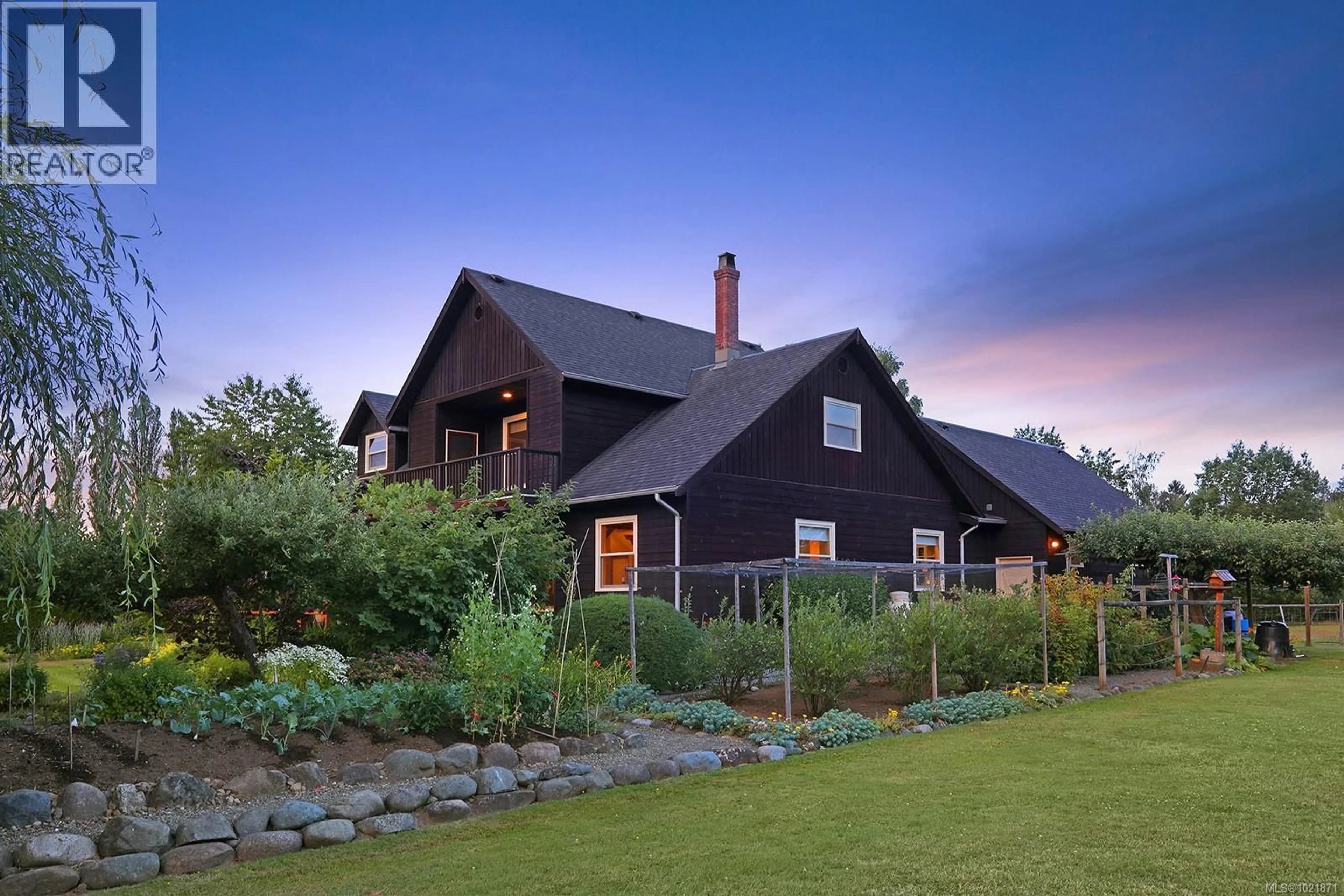 Home with brick exterior material, mountain view for 3713 DOVE CREEK ROAD, Courtenay British Columbia V9J1R9