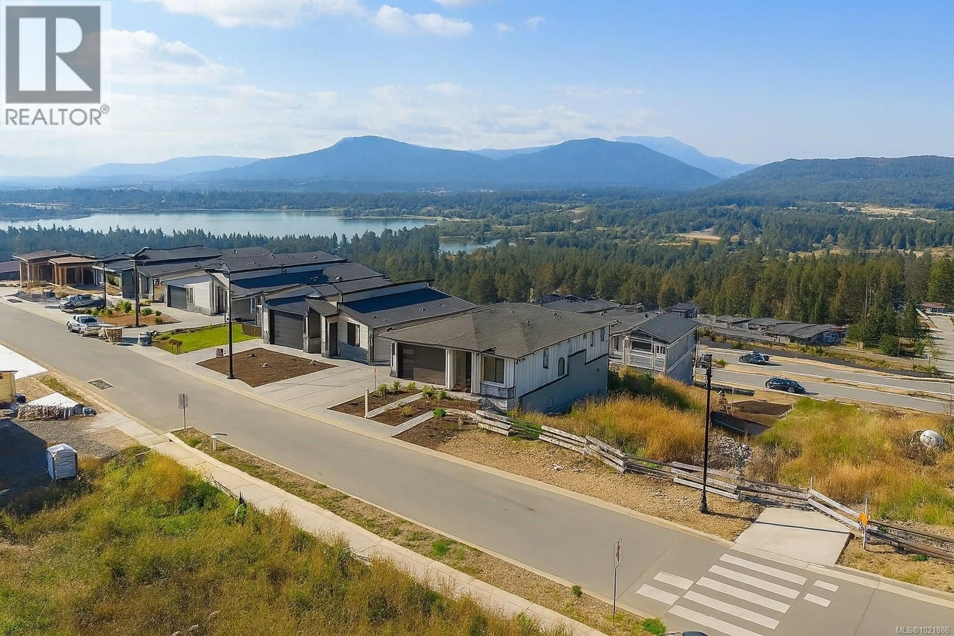 A pic from outside/outdoor area/front of a property/back of a property/a pic from drone, mountain view for 3195 WOODRUSH DRIVE, Duncan British Columbia V9L0G1