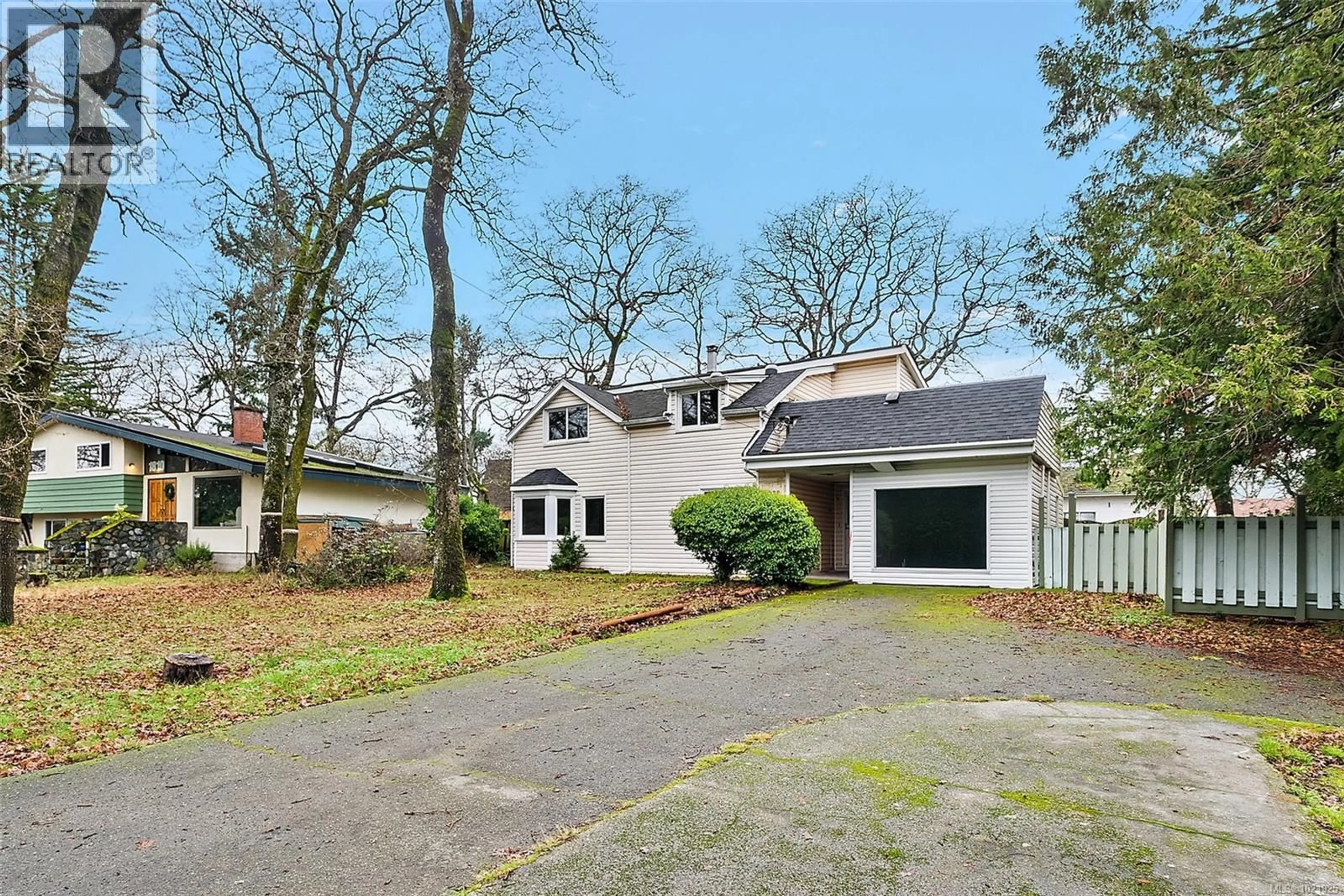 A pic from outside/outdoor area/front of a property/back of a property/a pic from drone, street for 1826 CEDAR HILL CROSS ROAD, Saanich British Columbia V8P2R4