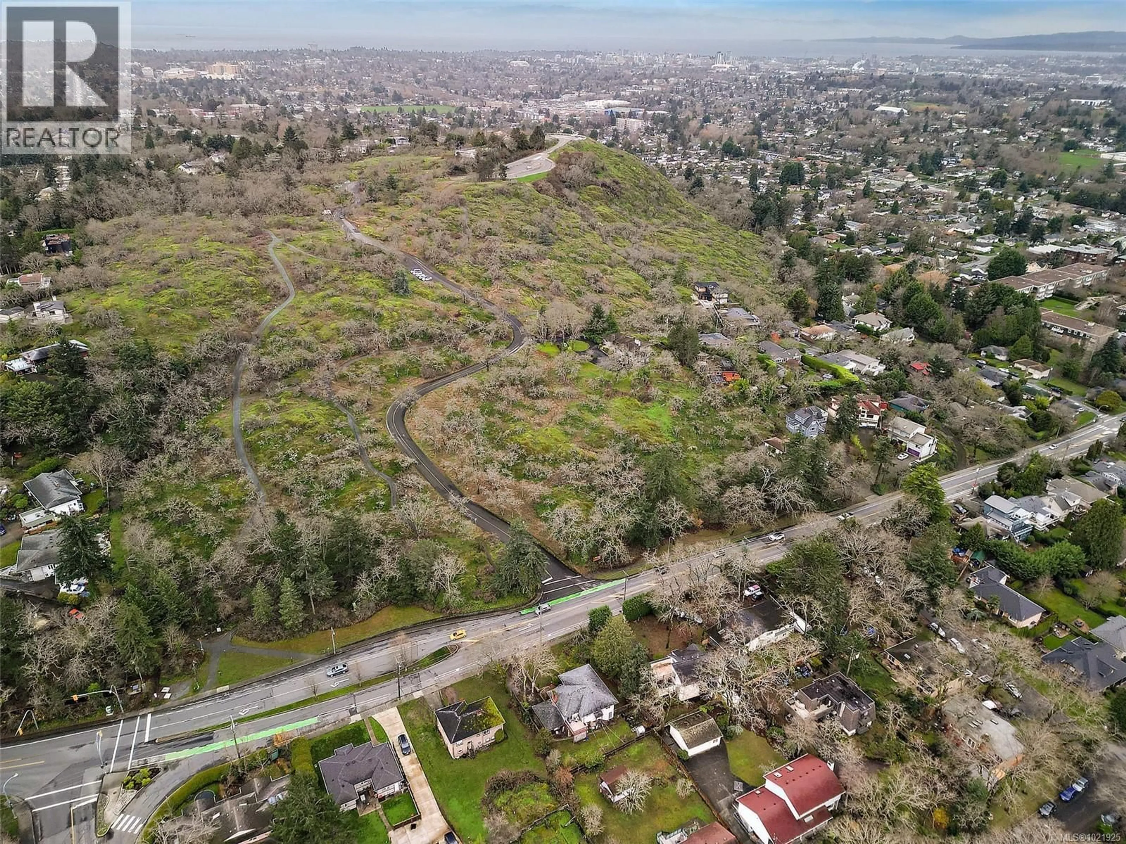 A pic from outside/outdoor area/front of a property/back of a property/a pic from drone, street for 1826 CEDAR HILL CROSS ROAD, Saanich British Columbia V8P2R4