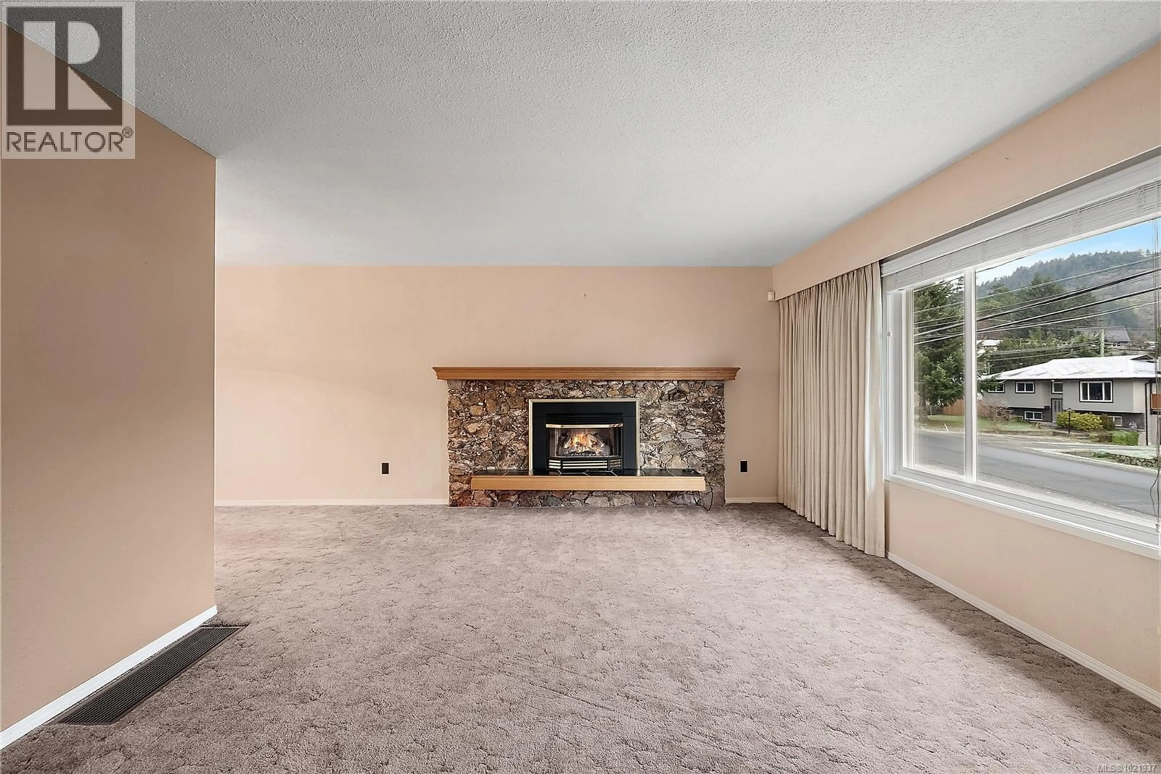 Living room with furniture, carpet floor for 2908 MOUNT WELLS DRIVE, Langford British Columbia V9B4S1