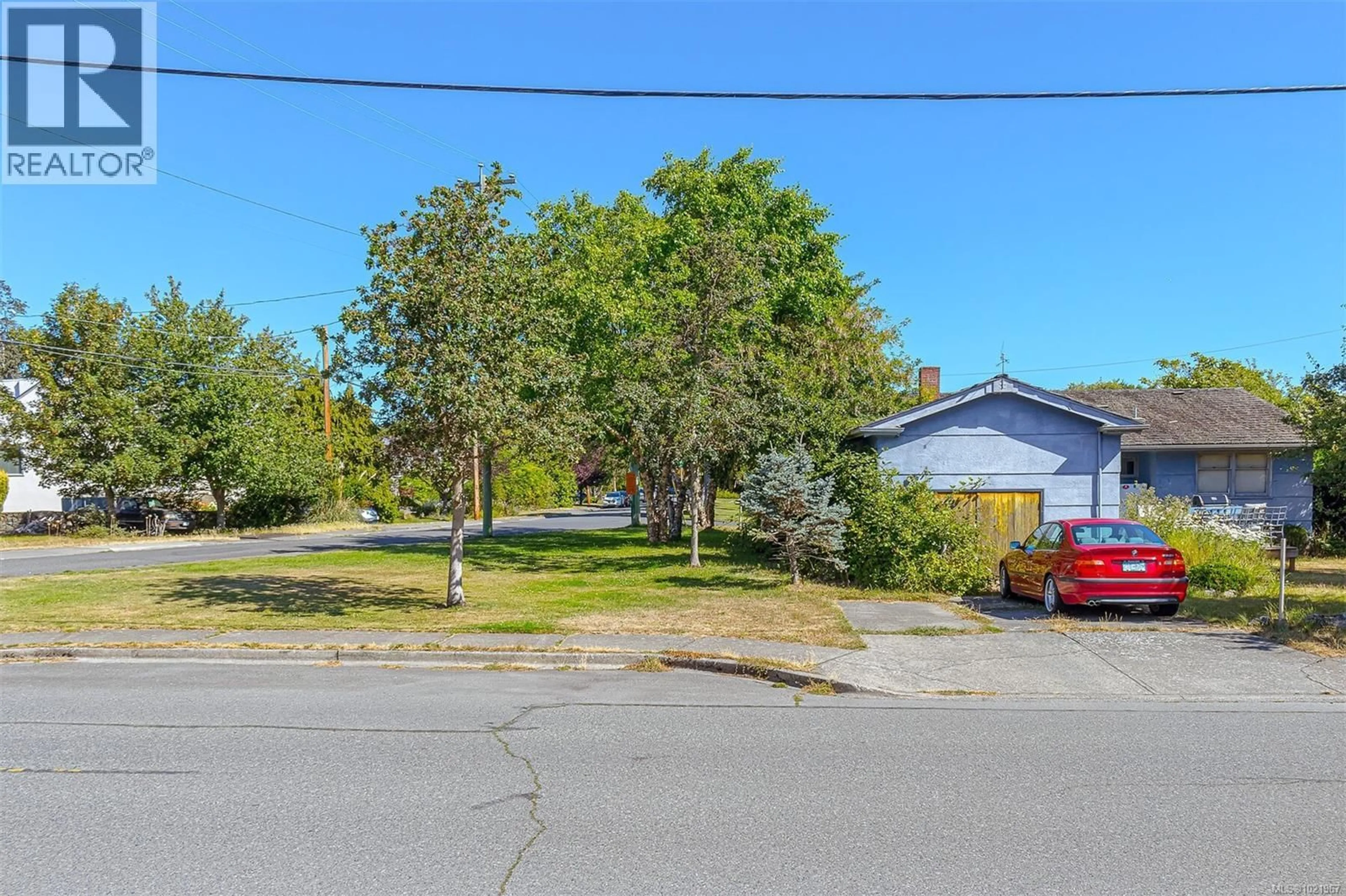 A pic from outside/outdoor area/front of a property/back of a property/a pic from drone, street for 2409 CURRIE ROAD, Oak Bay British Columbia V8S3B5